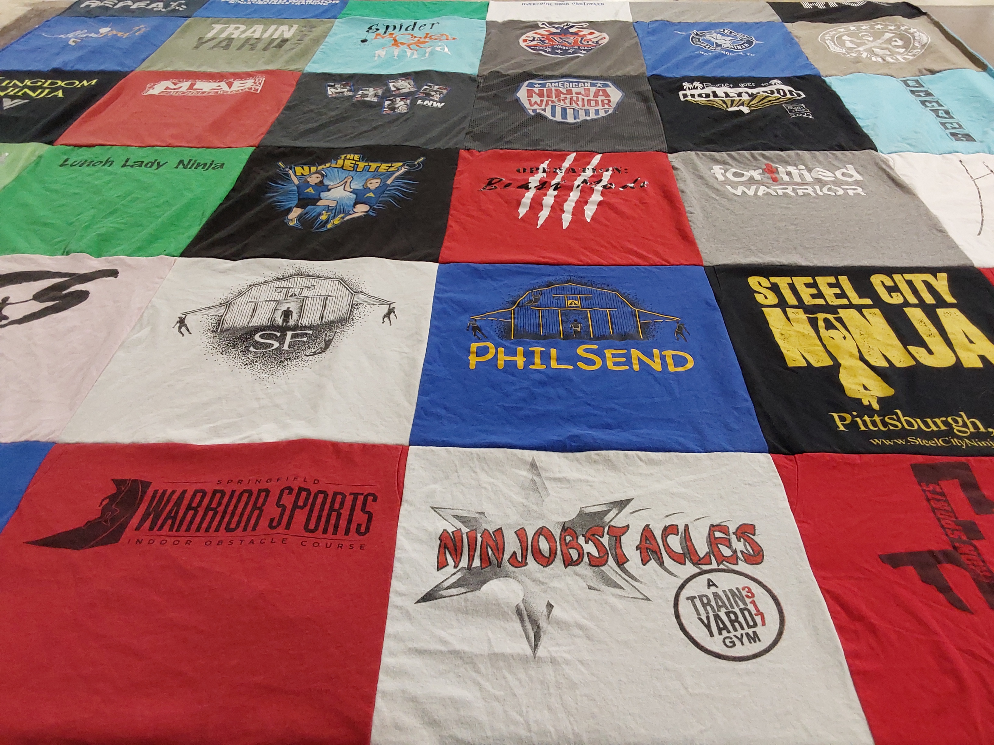 T-shirt quilt with ninja training, obstacle courses themes by Jamie from IN