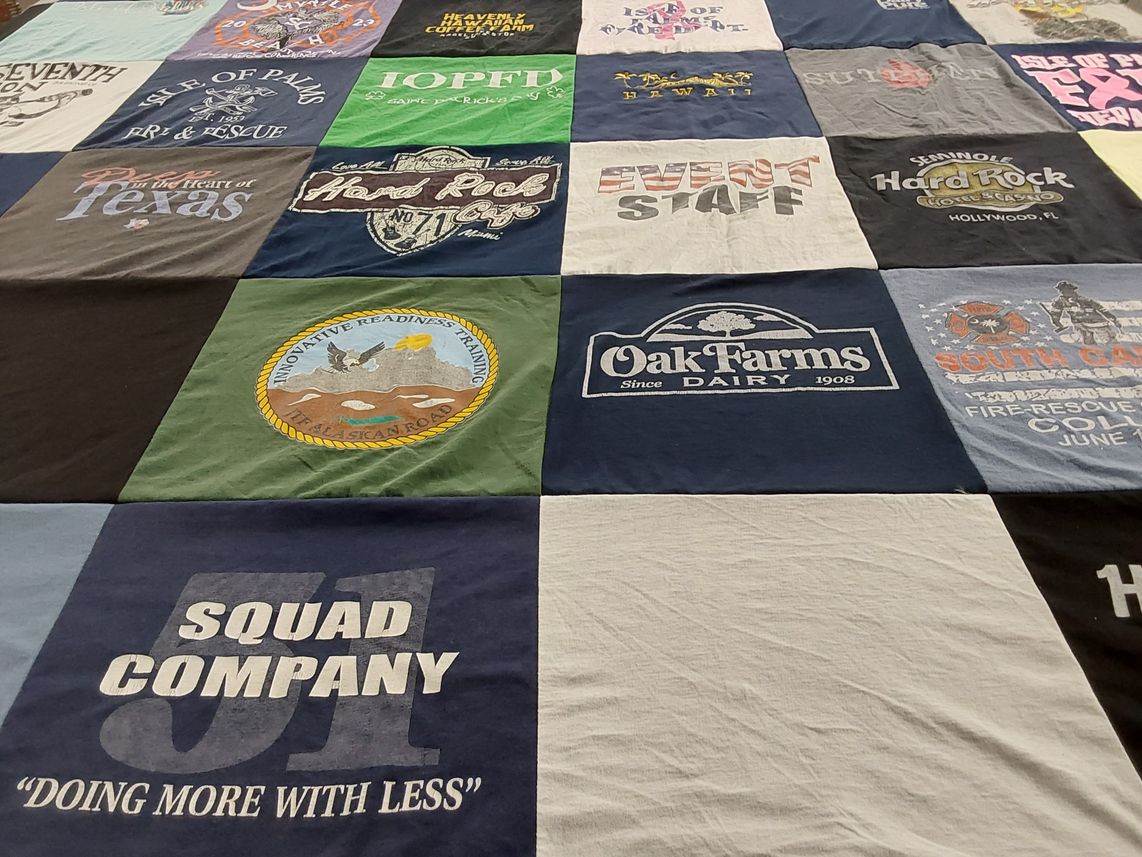 T-shirt quilt with firefighting, event planning themes by Tina from SC