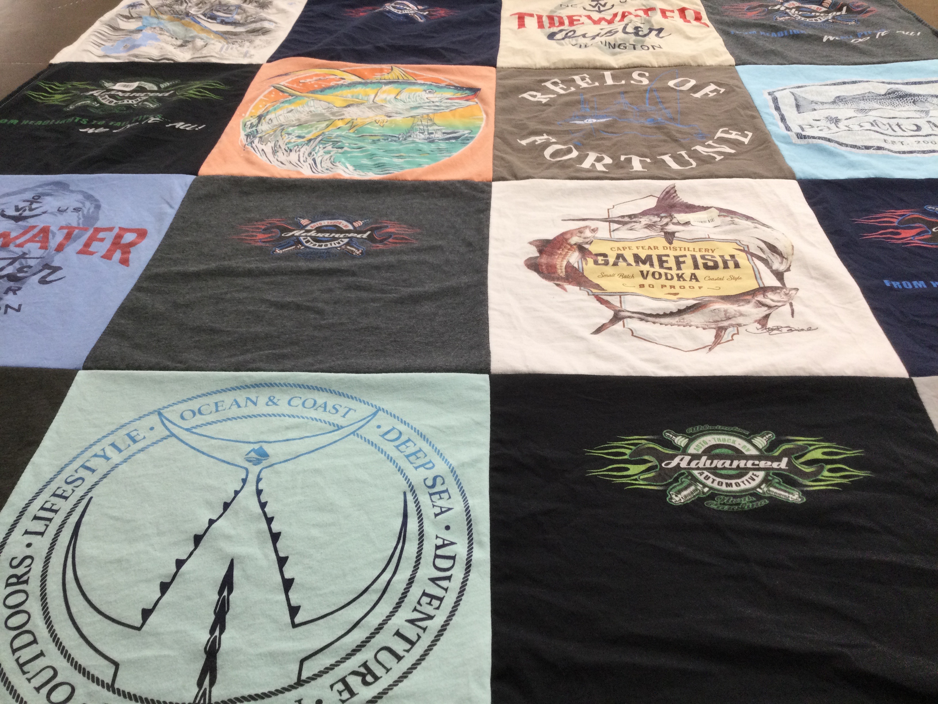T-shirt quilt with fishing, boating themes by Jodi from NC