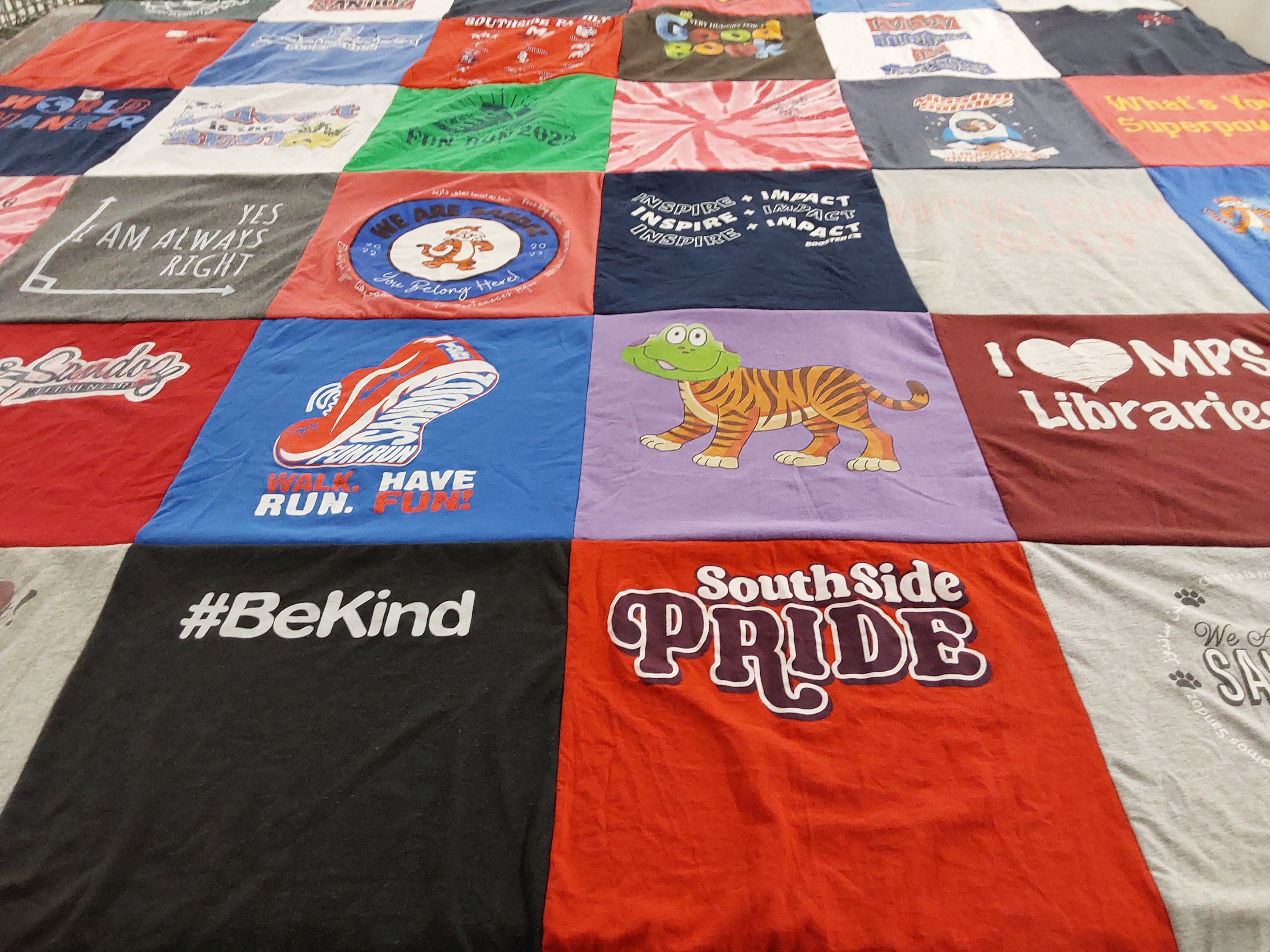 T-shirt quilt with education, libraries themes by Gina from NE