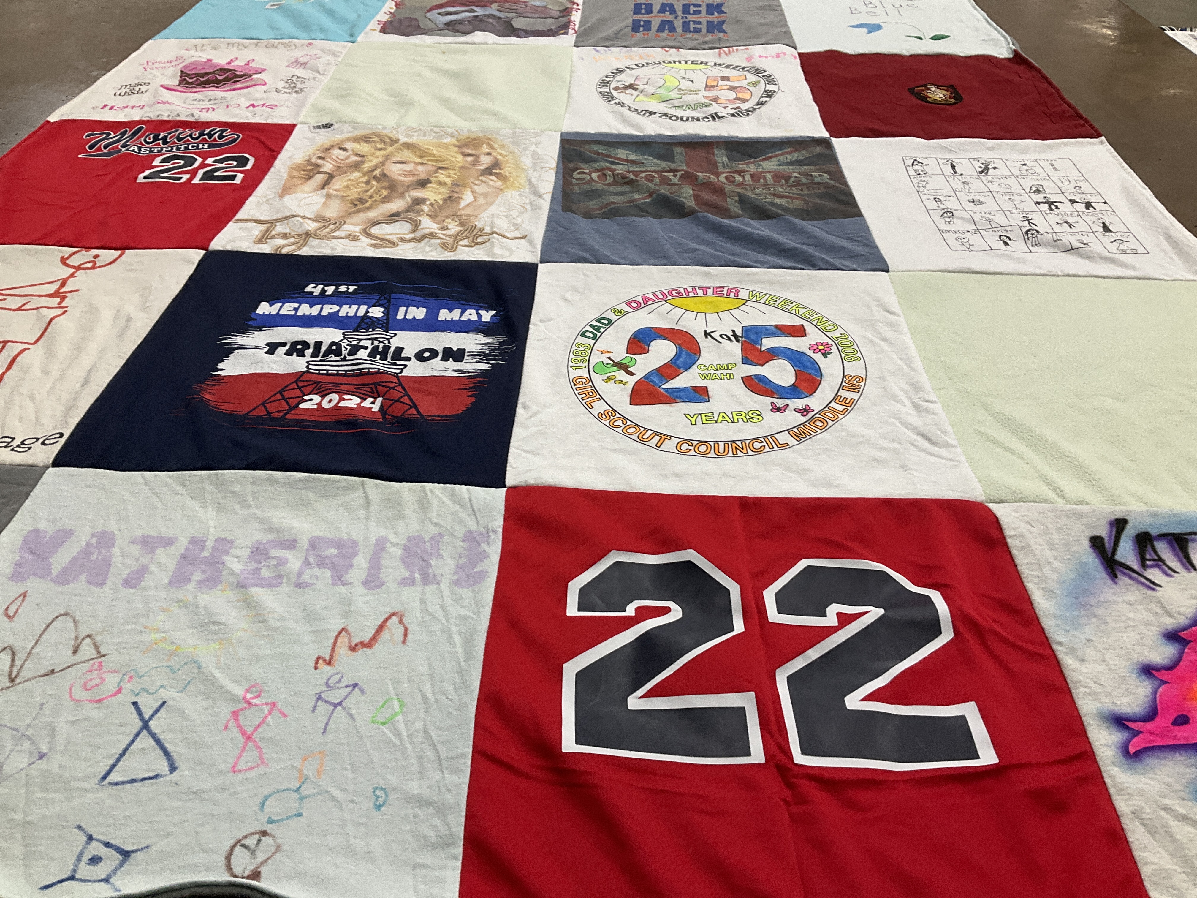 T-shirt quilt with triathlons, camping themes by Tracy from MS