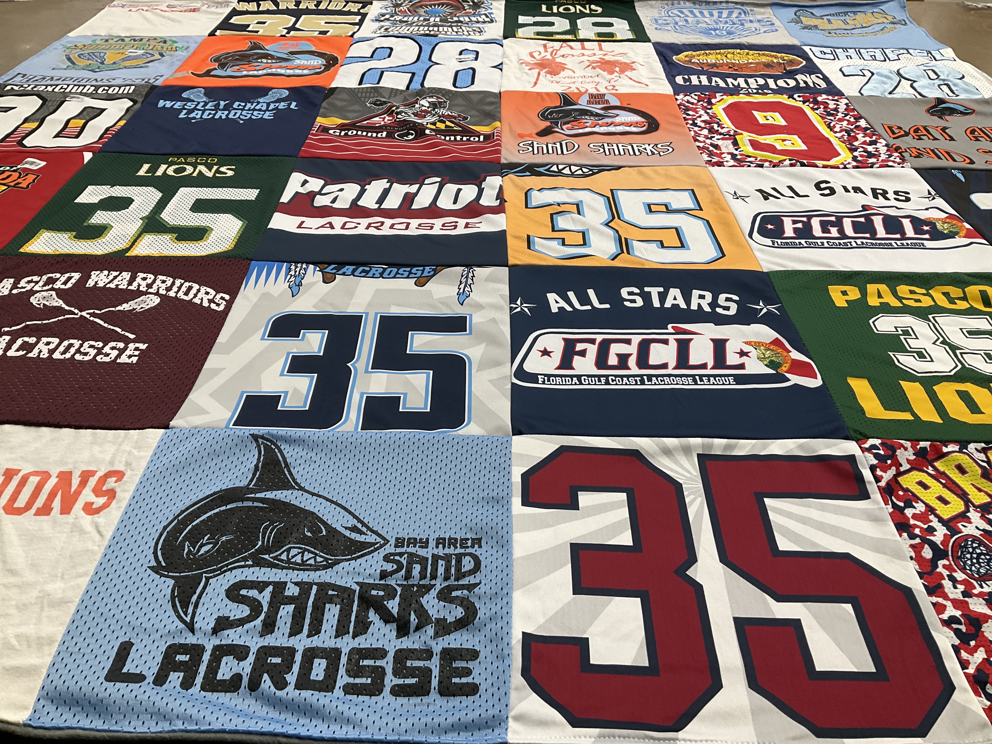 T-shirt quilt with lacrosse, sports themes by Kristine from FL