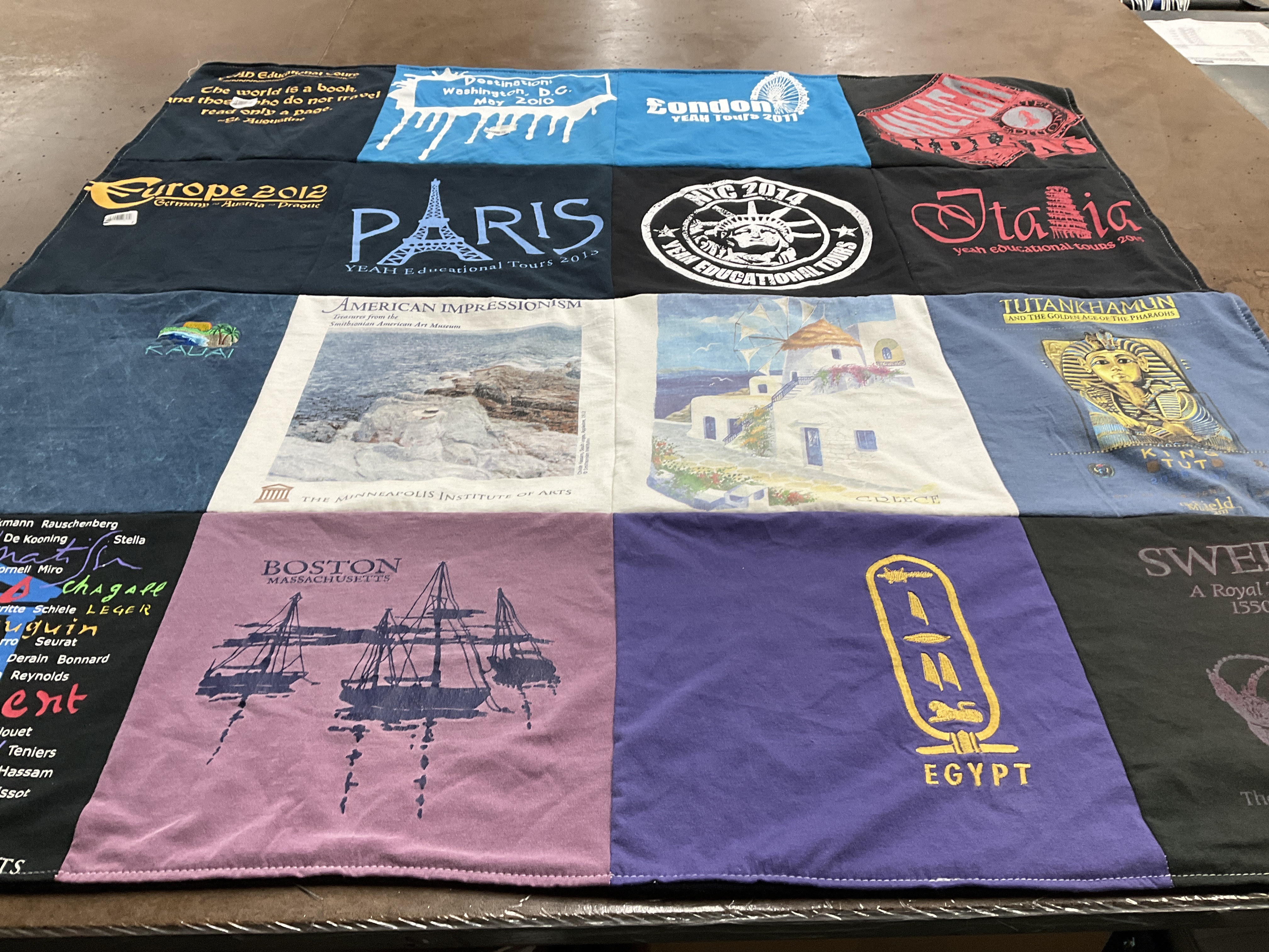 T-shirt quilt with travel, education themes by Cheryl from MN