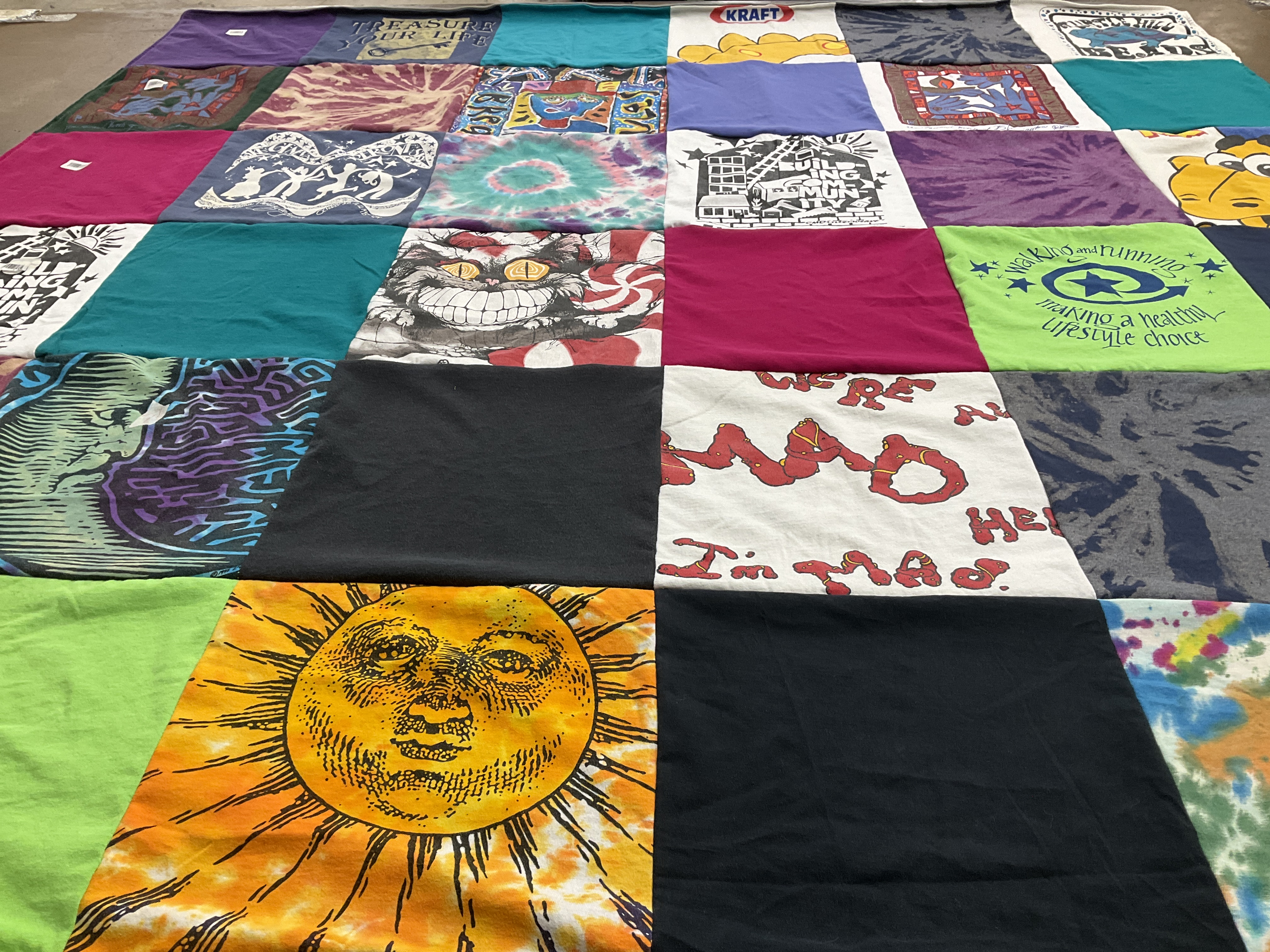 T-shirt quilt with lifestyle, health themes by Joyce from MN