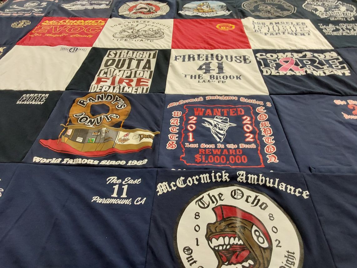 T-shirt quilt with firefighting, cooking themes by Emily from CA