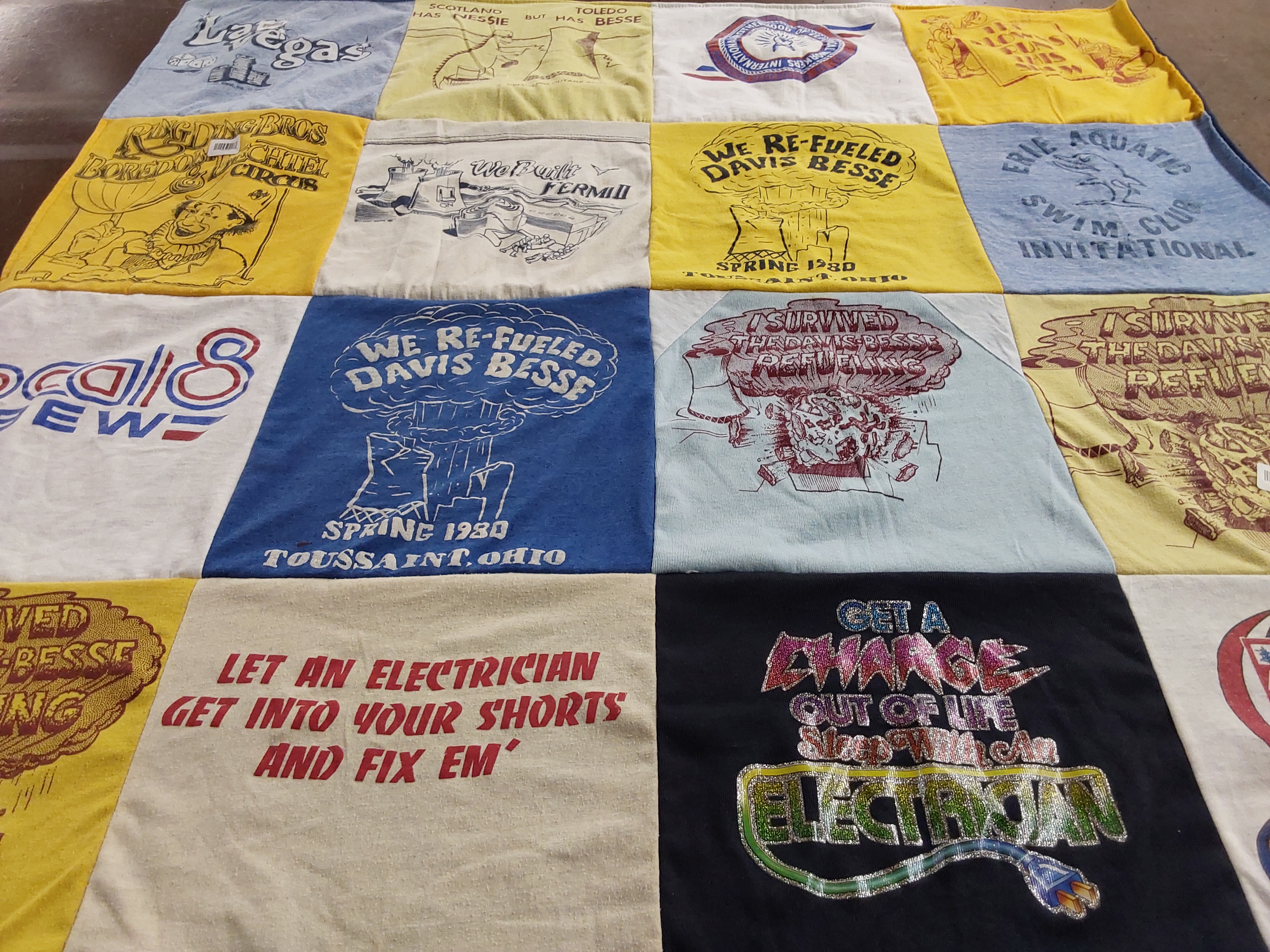 T-shirt quilt with electricity, swimming themes by Carol from OH