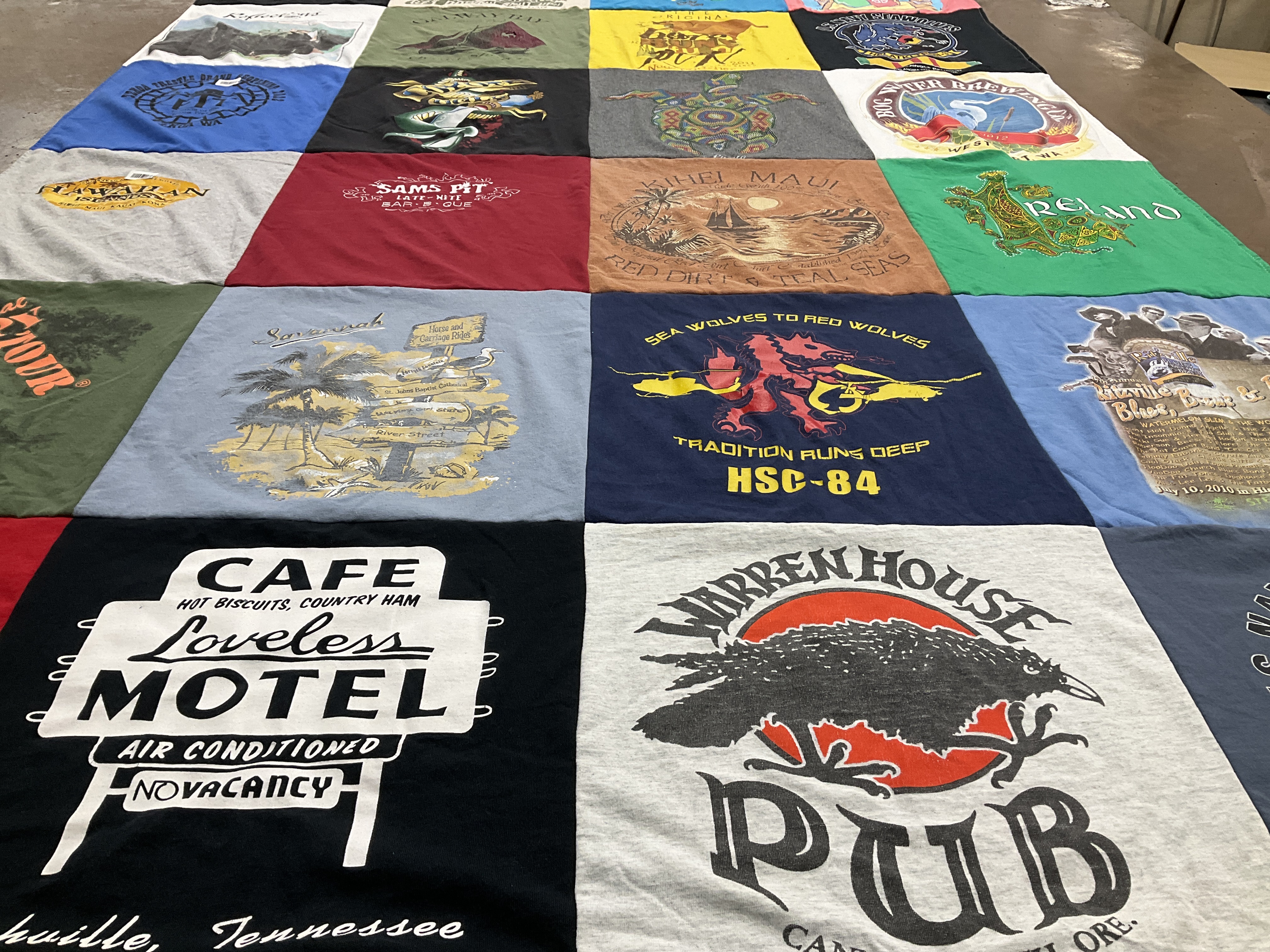 T-shirt quilt with restaurants, travel themes by Lee from WA