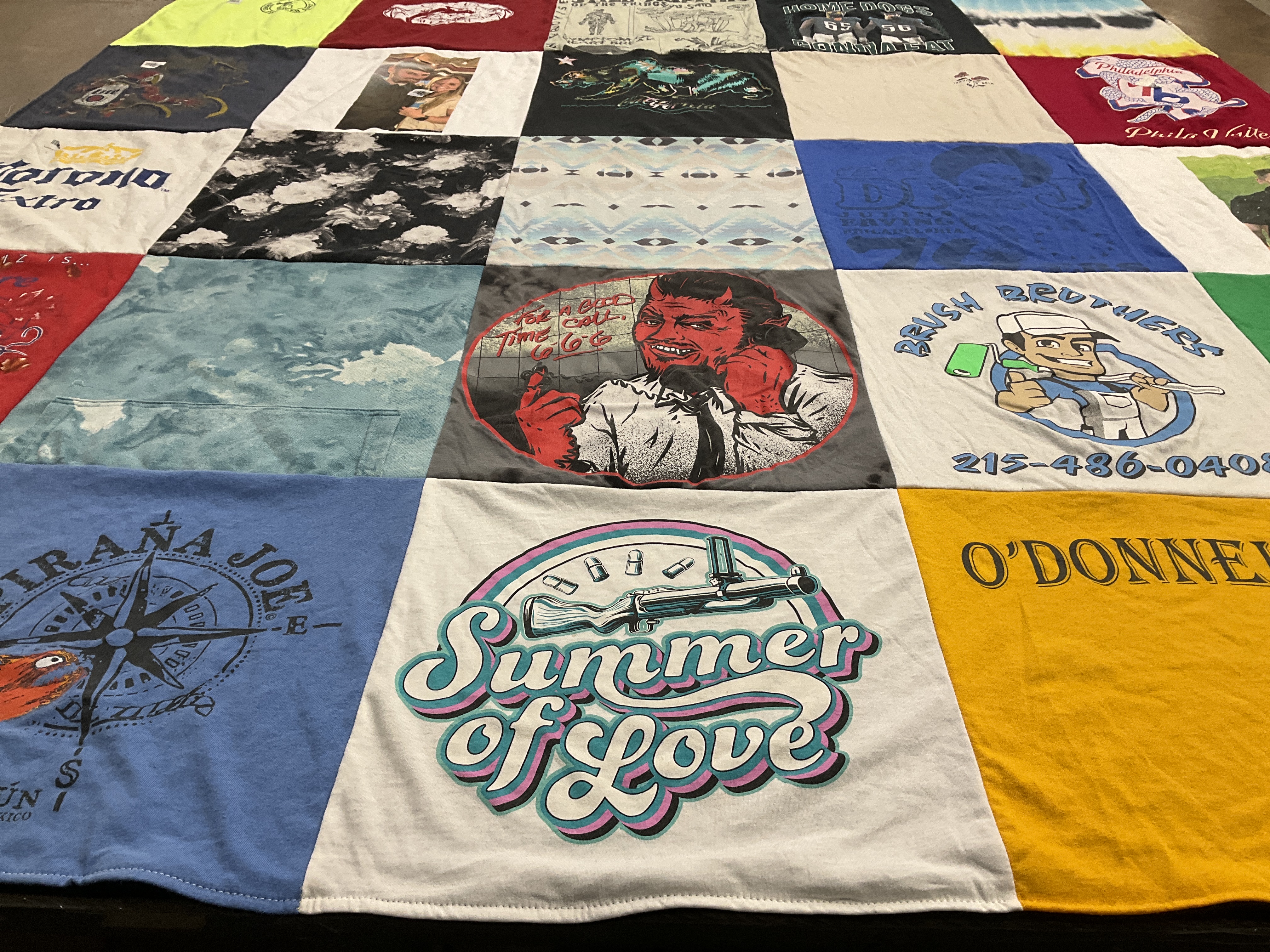 T-shirt quilt with summer events, local businesses themes by Brooke from PA