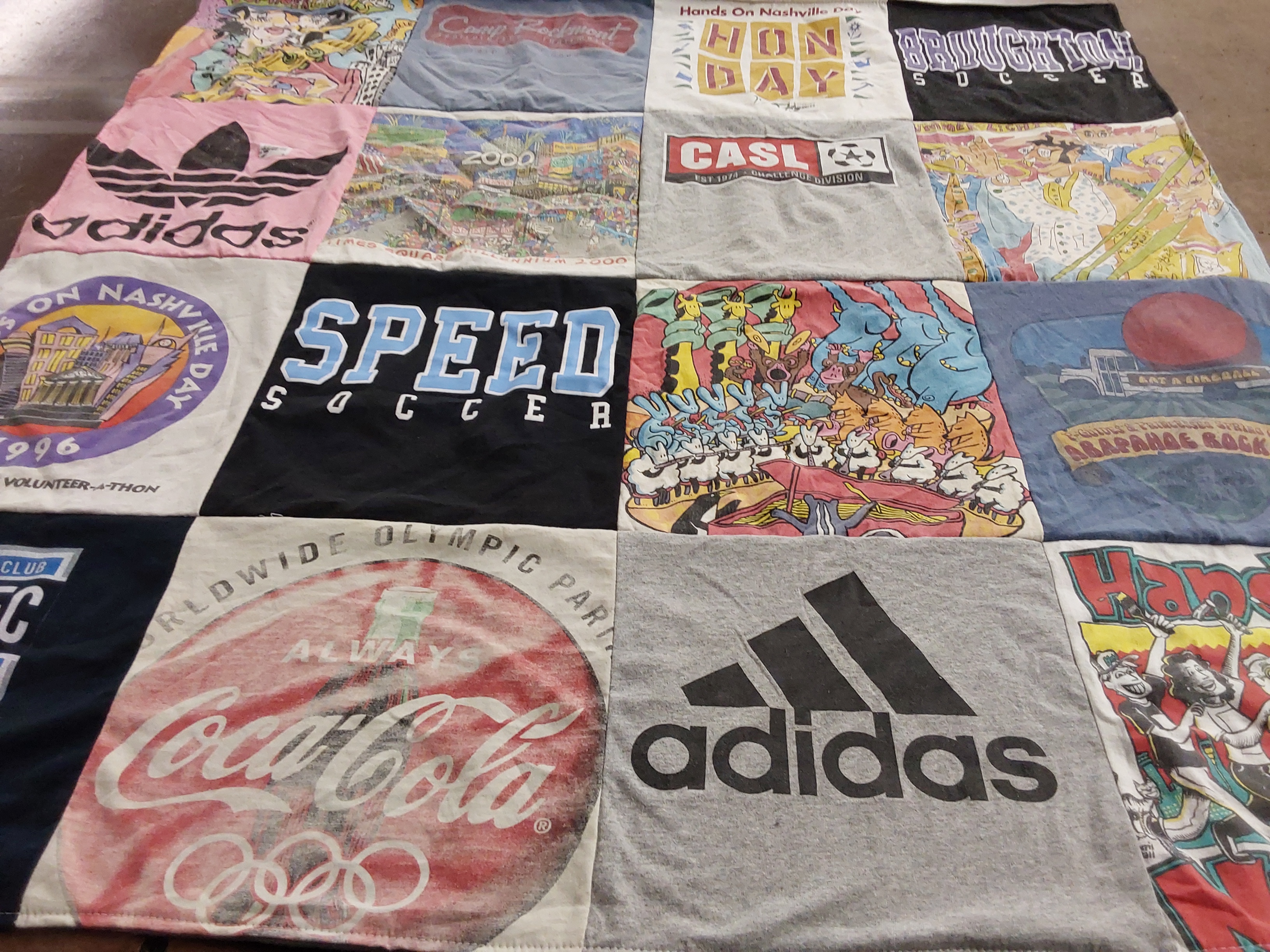 T-shirt quilt with soccer, volunteering themes by Tony from NC
