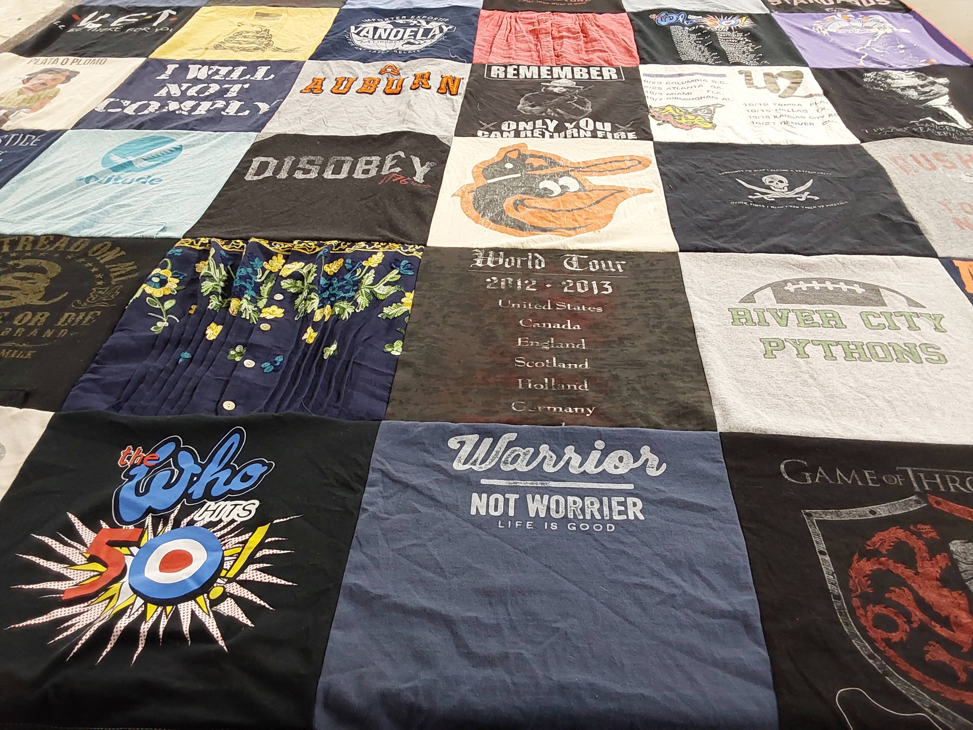 T-shirt quilt with music, travel themes by Michelle from AL