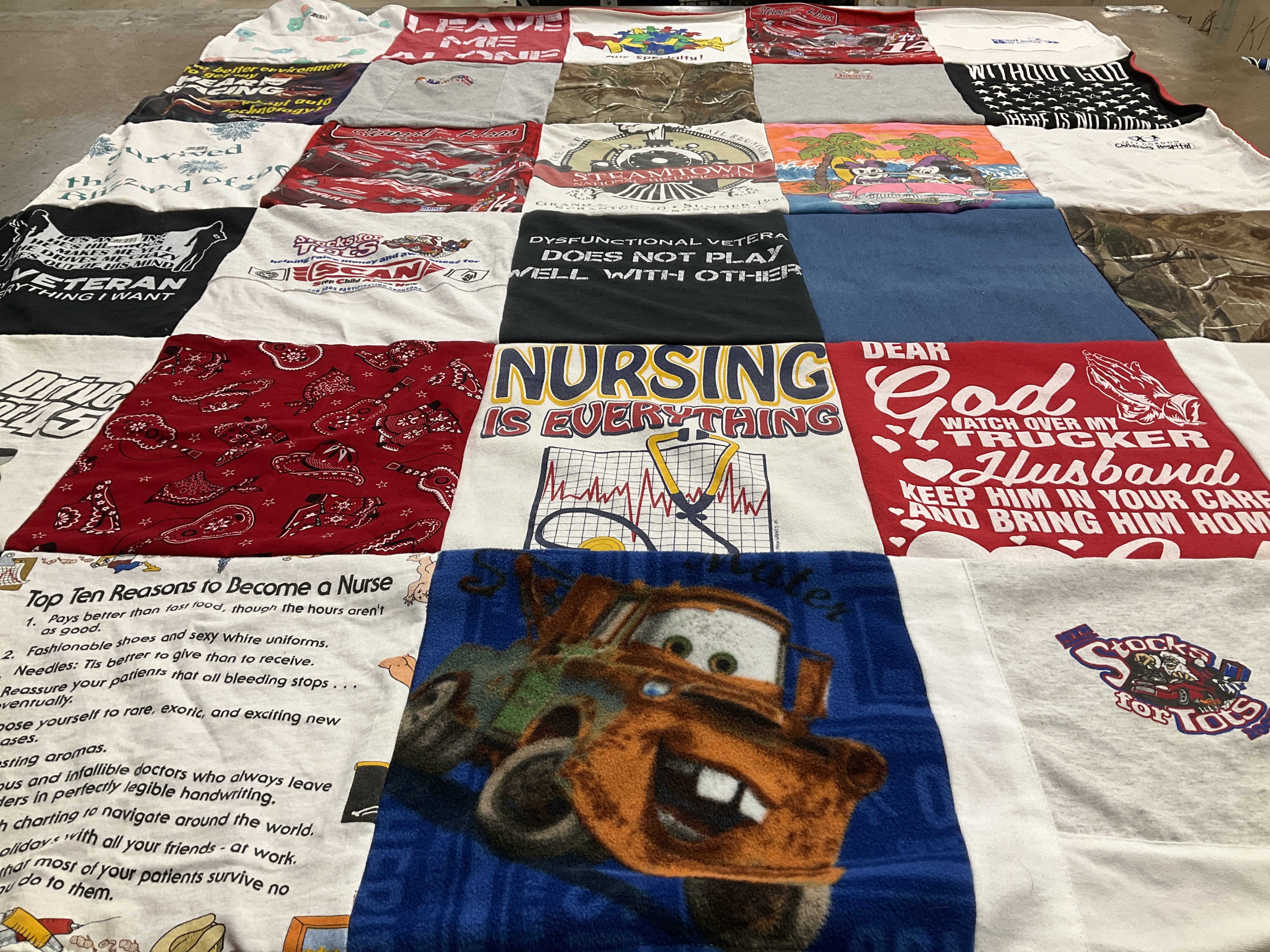 T-shirt quilt with nursing, veterans themes by Anjeannette from NC