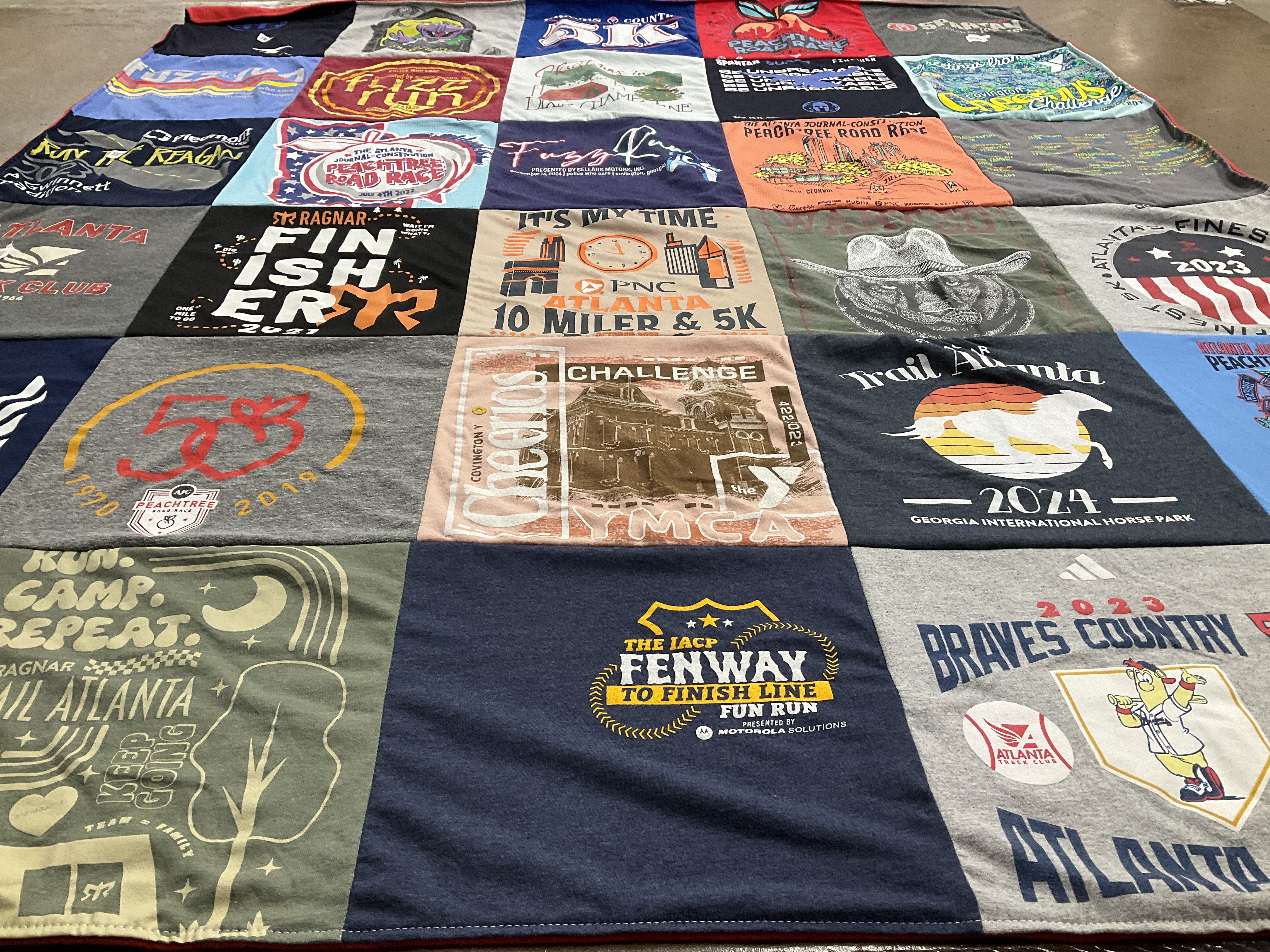 T-shirt quilt with running, sports themes by Kelly from GA