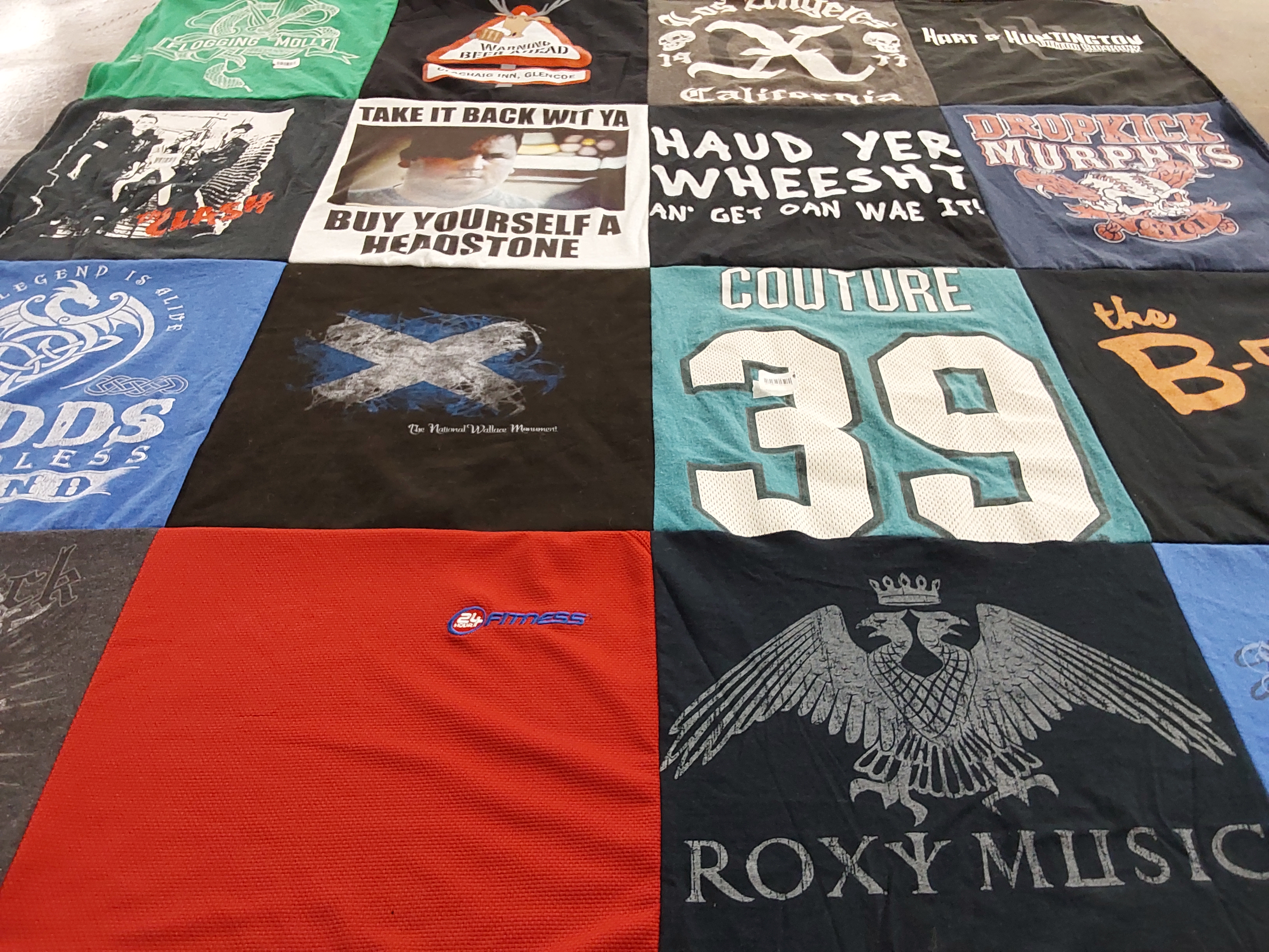 T-shirt quilt with music, fitness themes by Kelley from CA