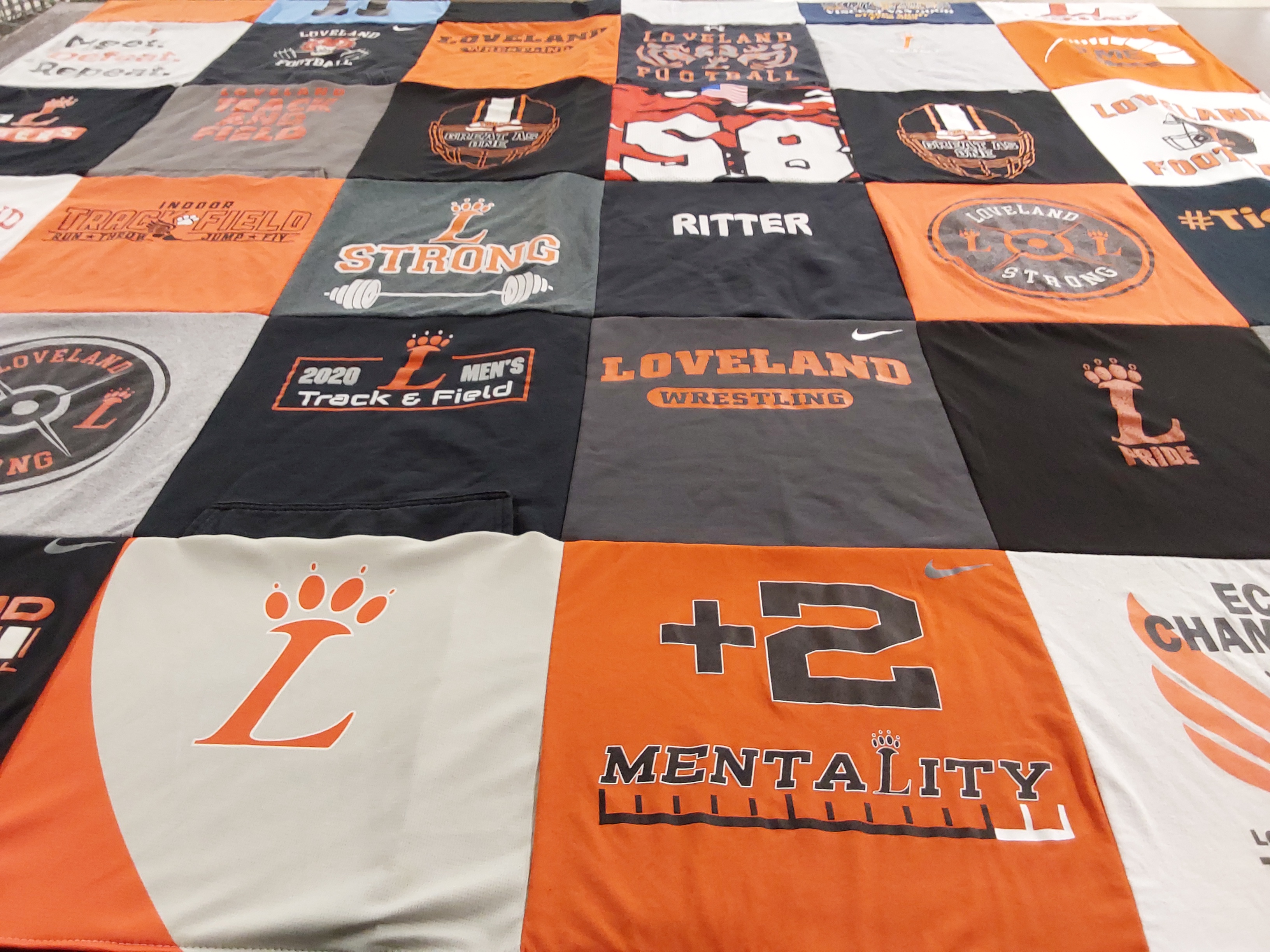 T-shirt quilt featuring loveland high school track and field, loveland high school wrestling by Paula from OH