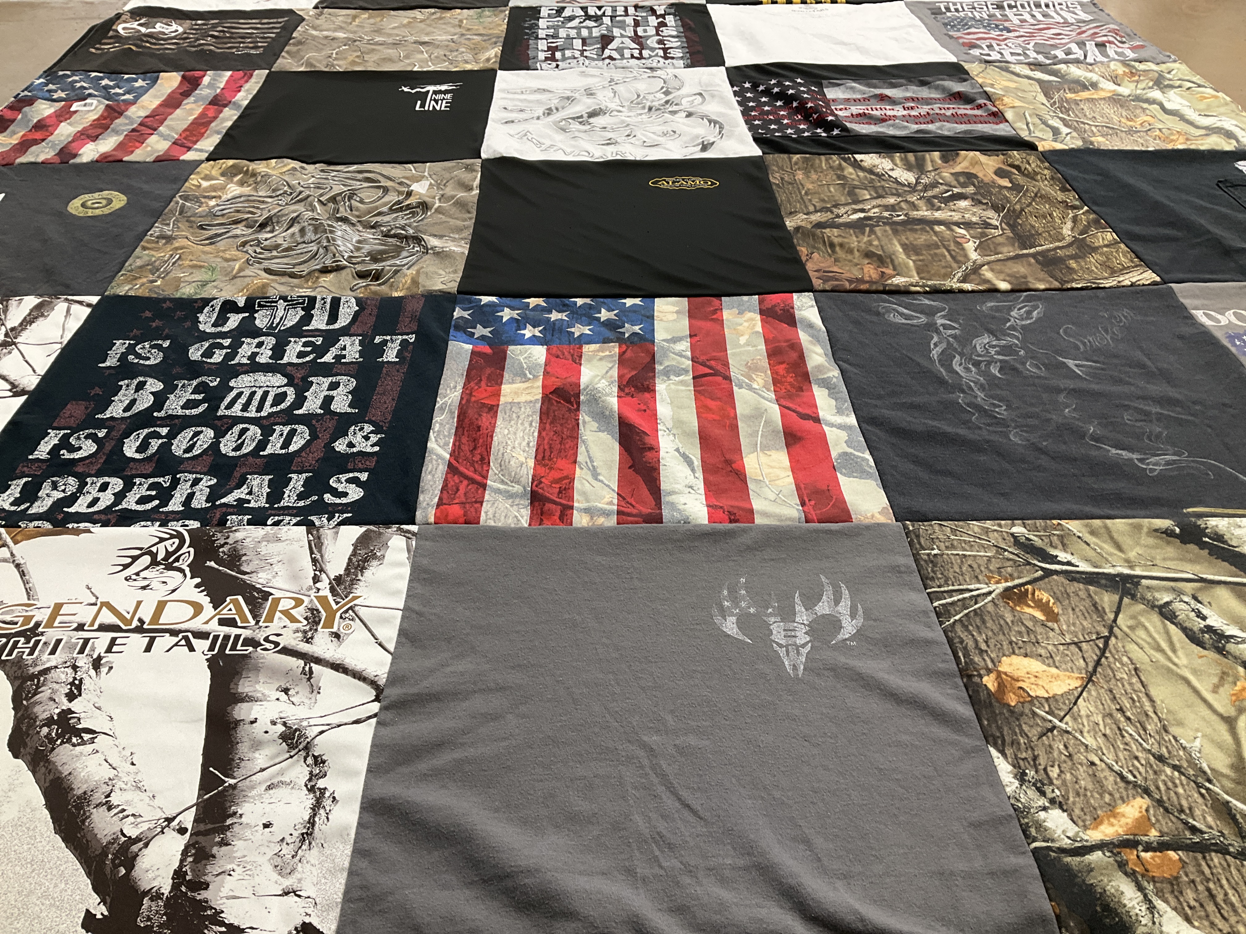 T-shirt quilt with hunting, outdoors themes by Anne from FL