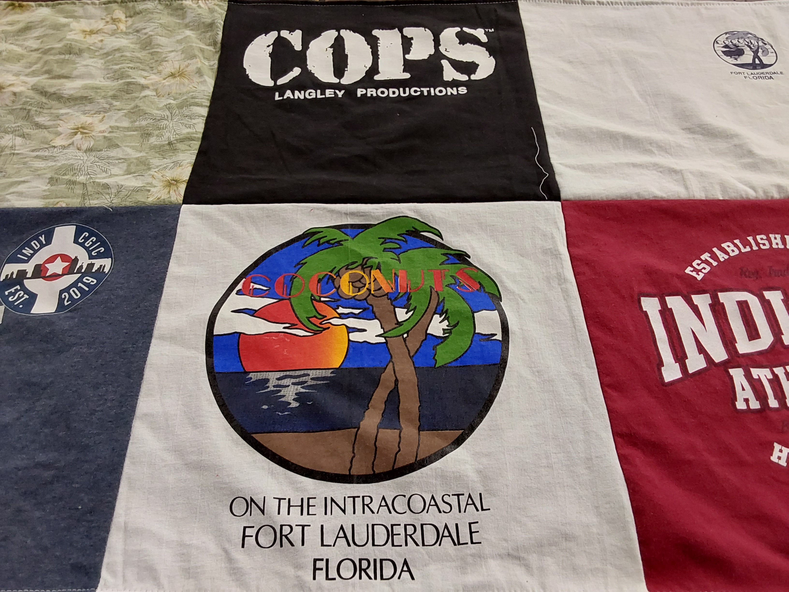 T-shirt quilt with television, restaurants themes by Cheryl from IN