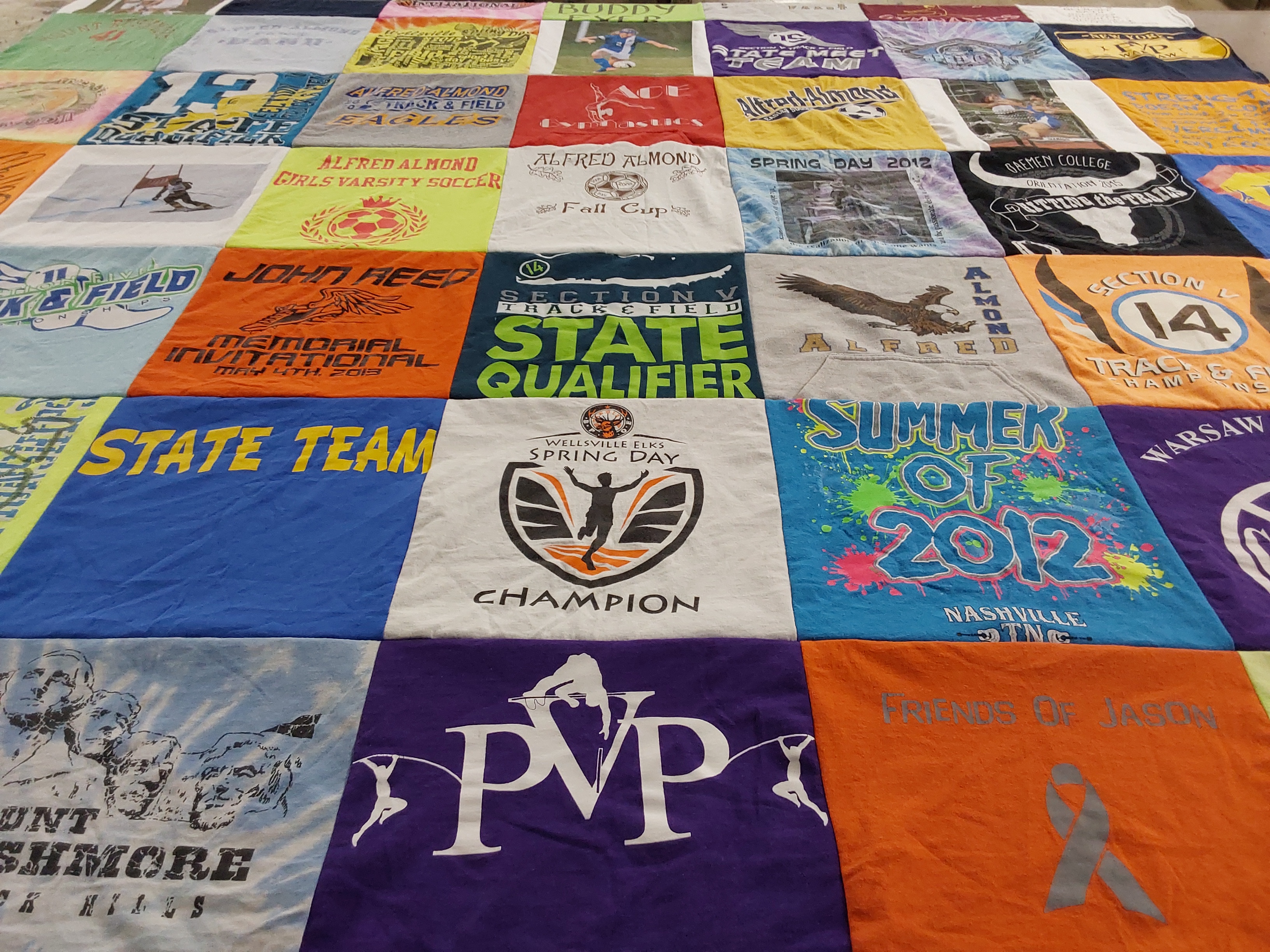 T-shirt quilt featuring wellsville varsity team, alfred almond girls varsity soccer by Cheryl from NY