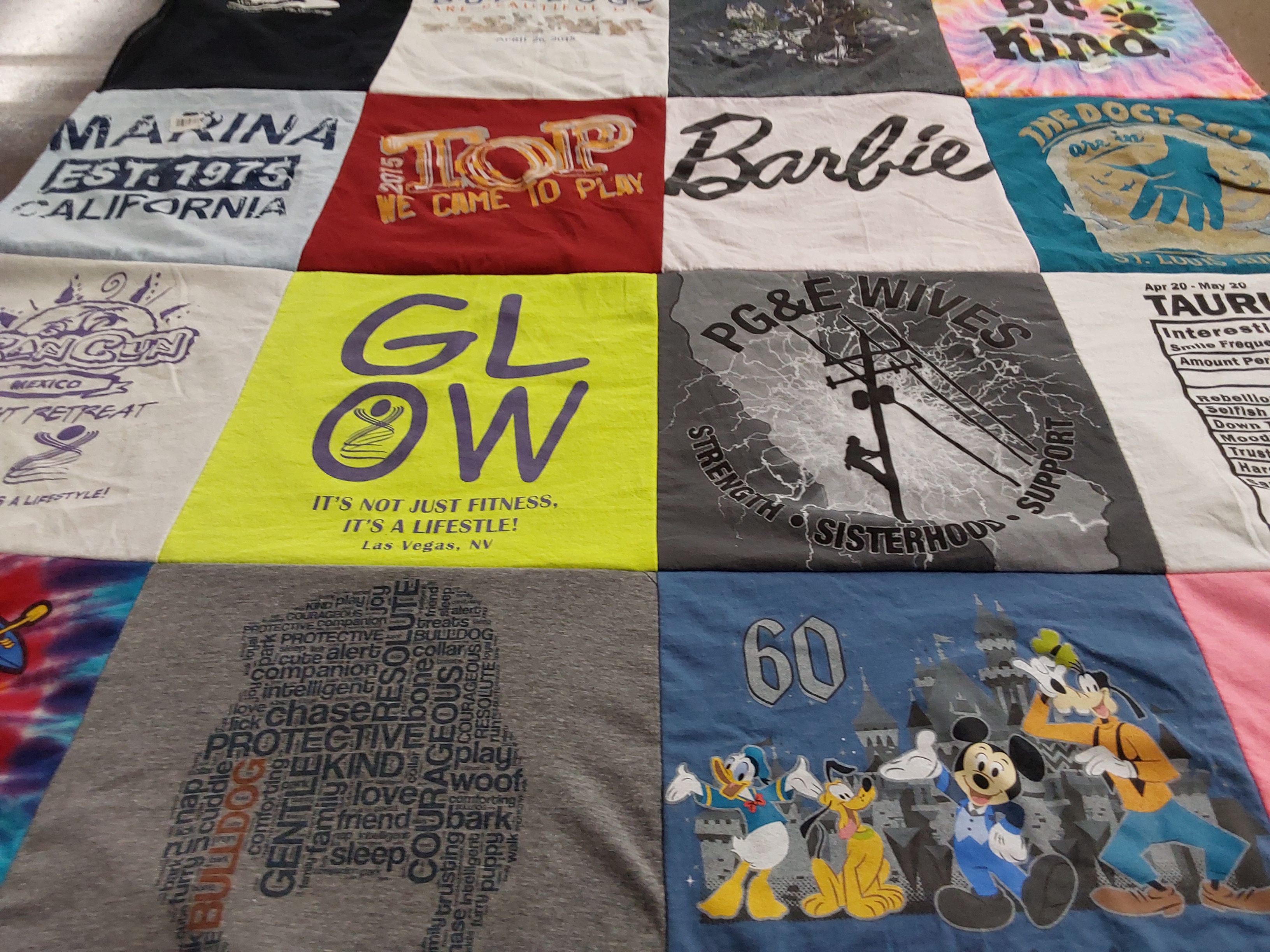 T-shirt quilt with fitness, lifestyle themes by Arlene from NV