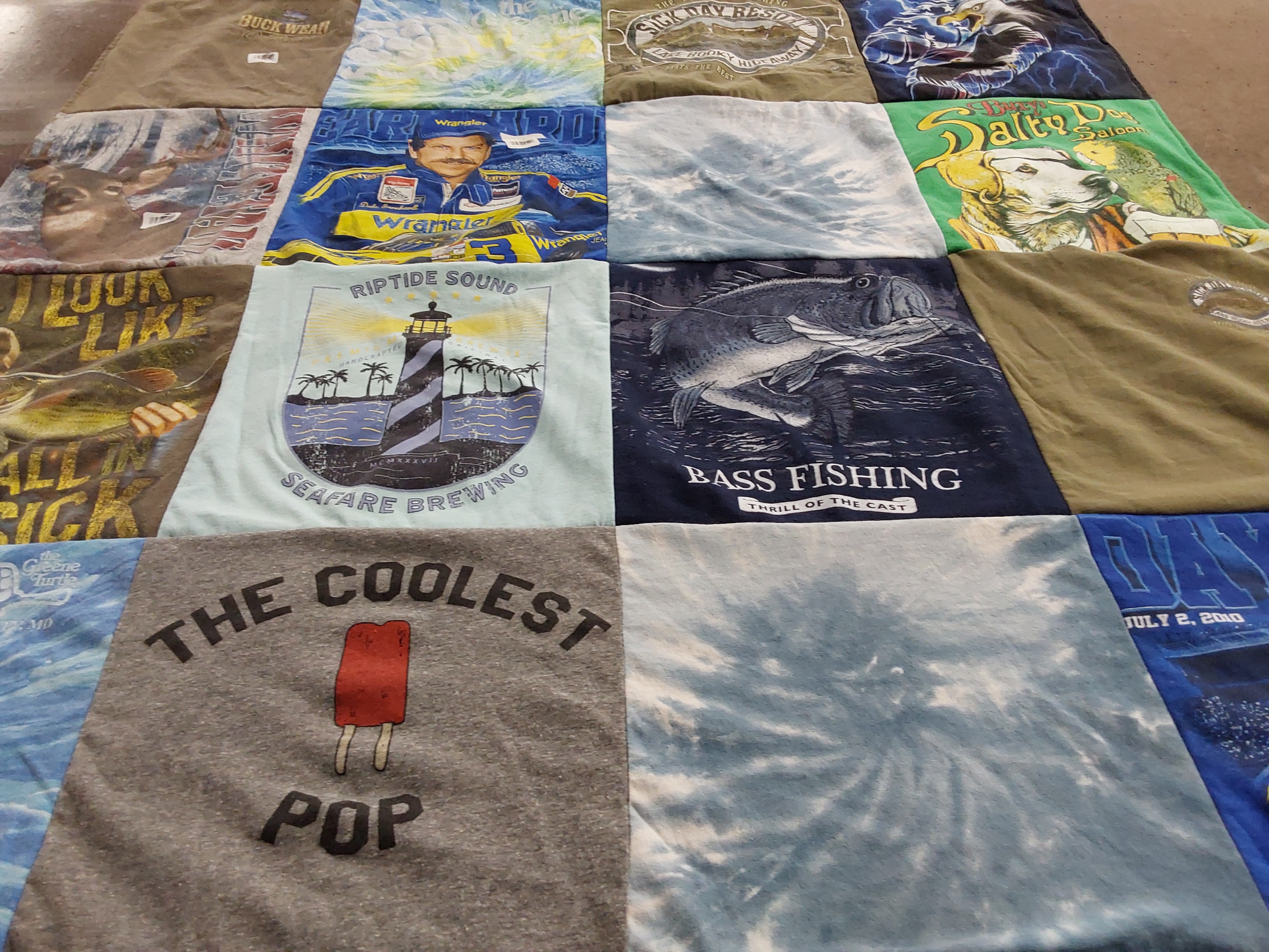 T-shirt quilt with fishing, brewing themes by Sheri from NJ
