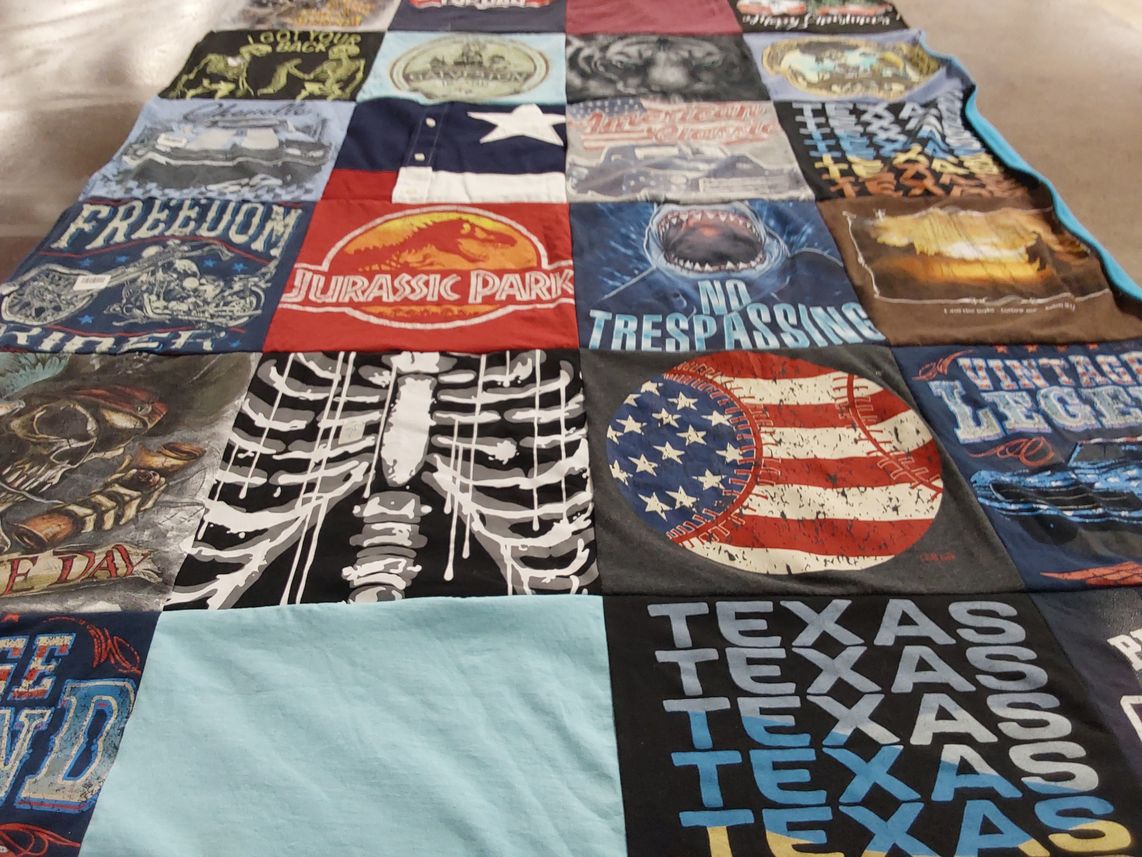 T-shirt quilt with movies, dinosaurs themes by Valerie from TX