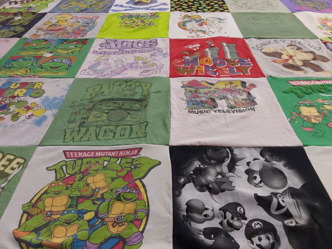 T-shirt quilt with video games, cartoons themes by Misty from WA