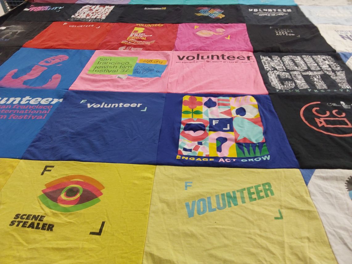 T-shirt quilt with film, volunteering themes by Robert from CA