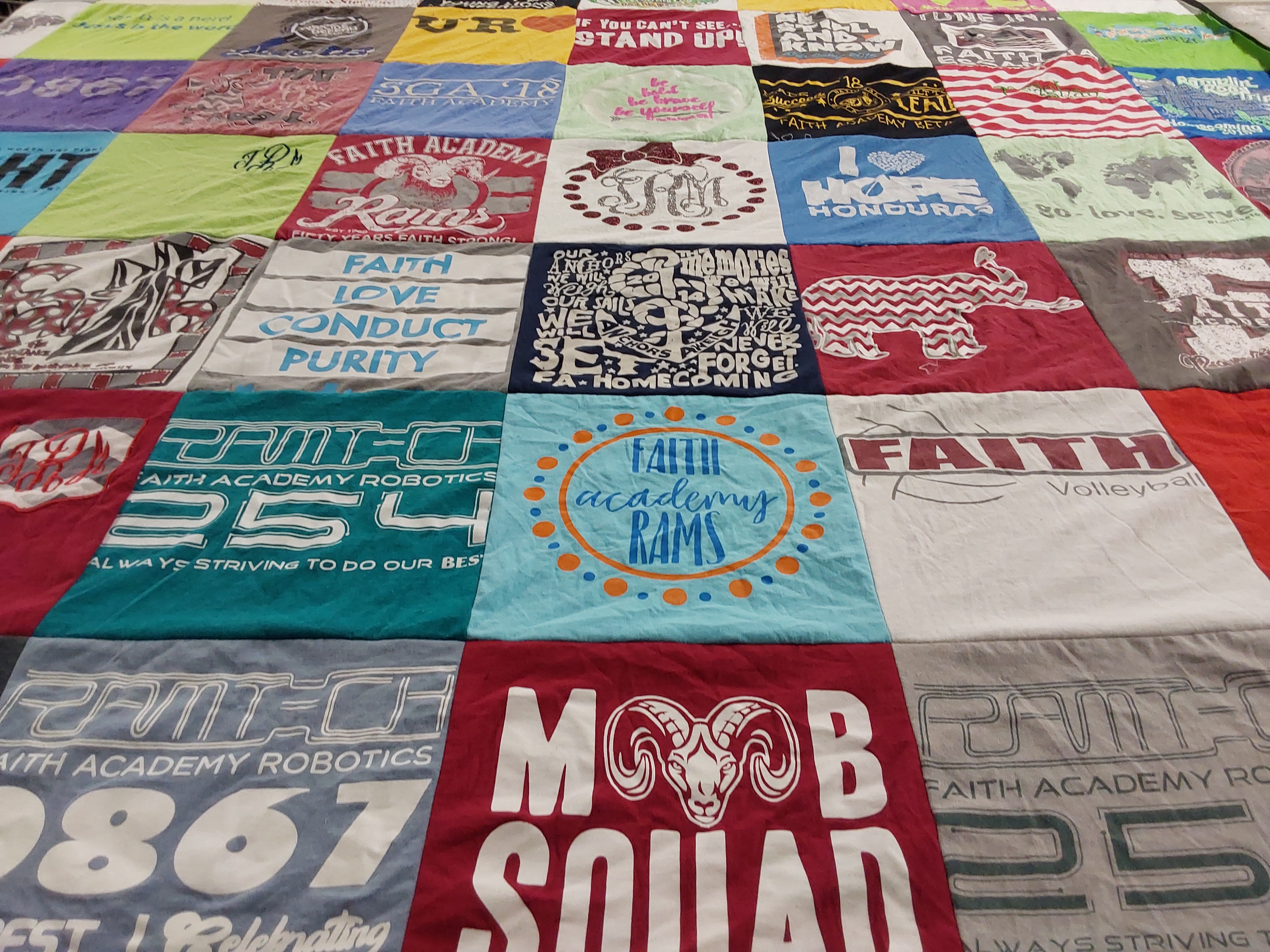 T-shirt quilt featuring faith academy rams by Home from AL