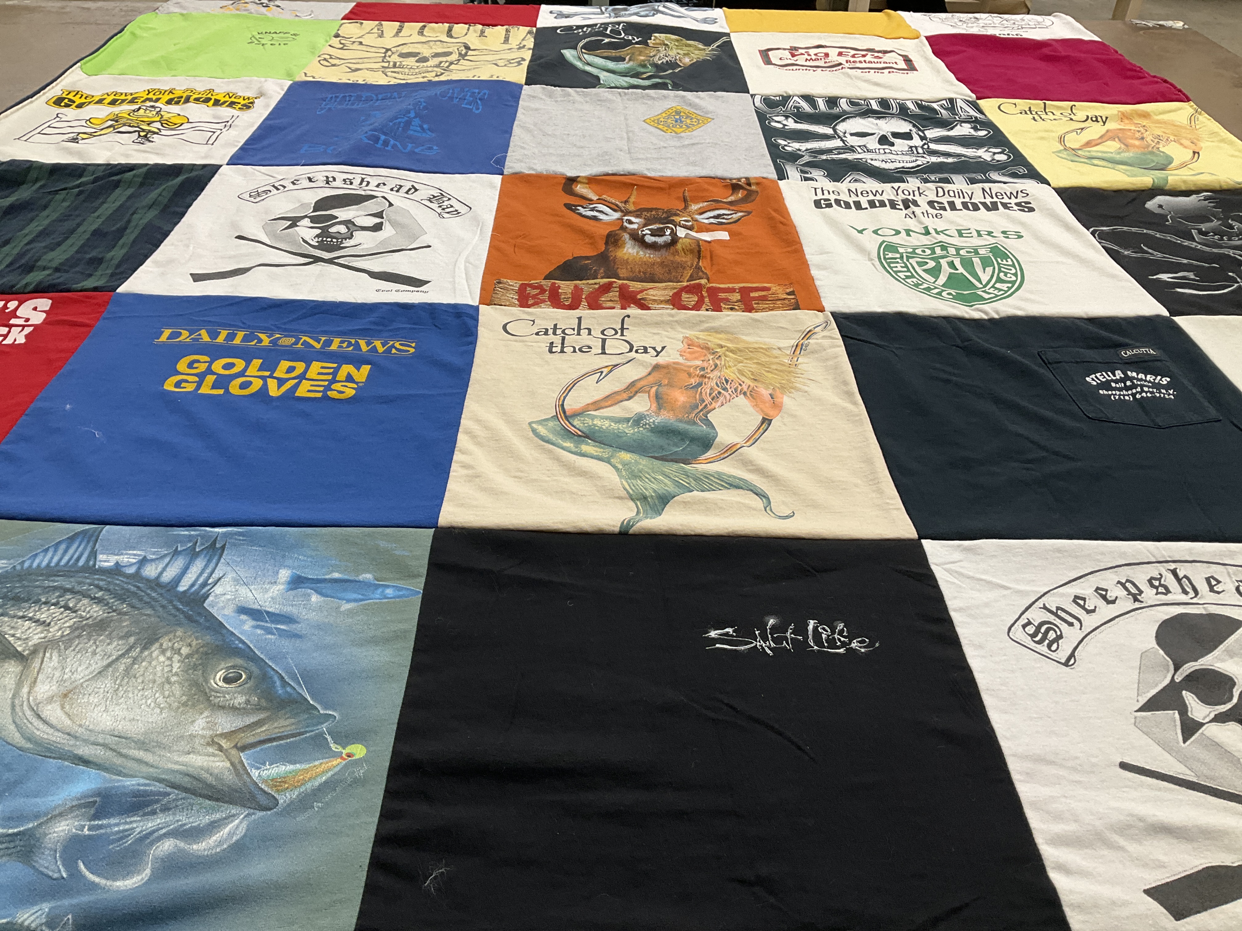 T-shirt quilt with fishing themes by Eric from CA