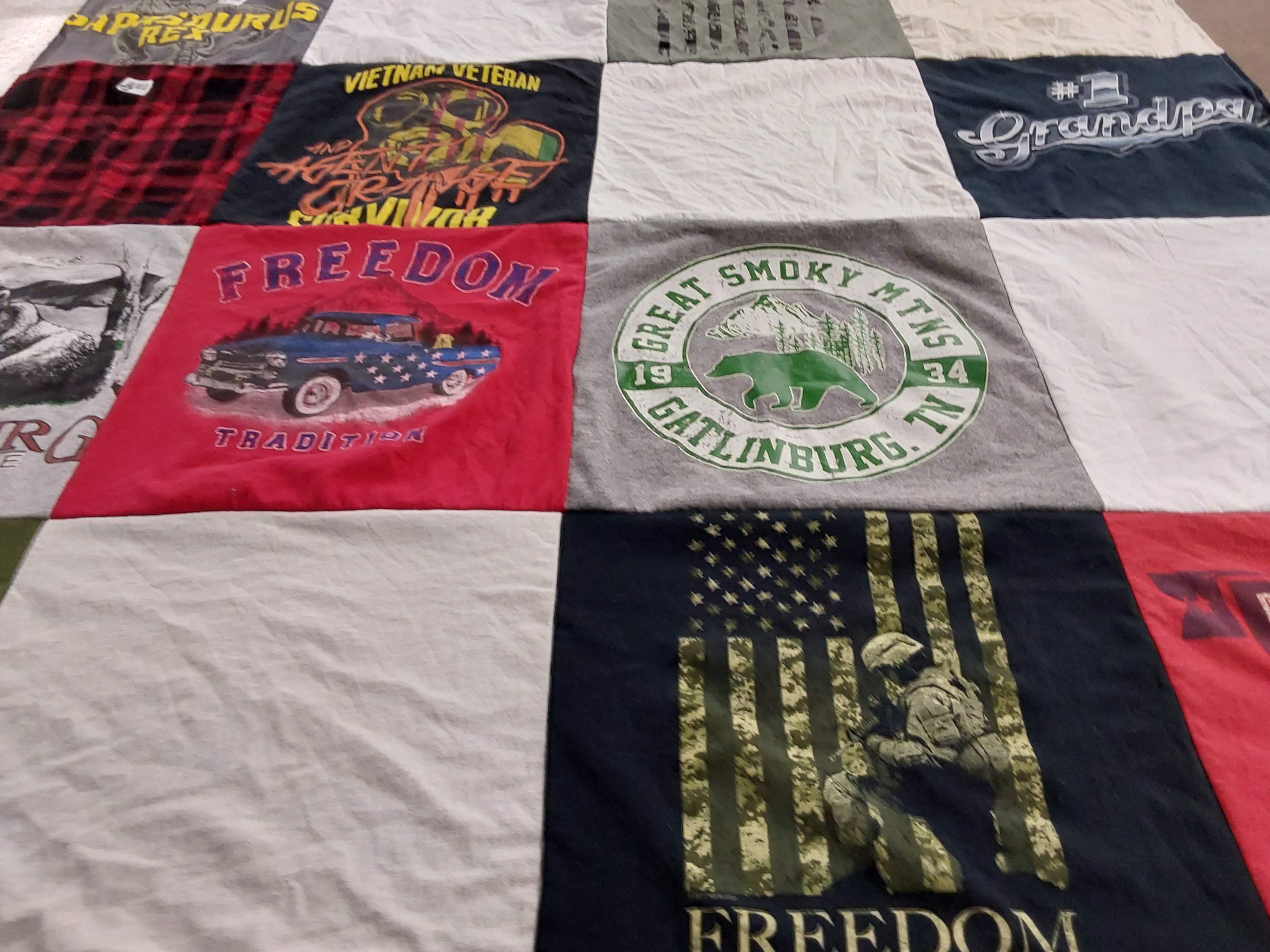 T-shirt quilt with travel, family themes by Keely from GA