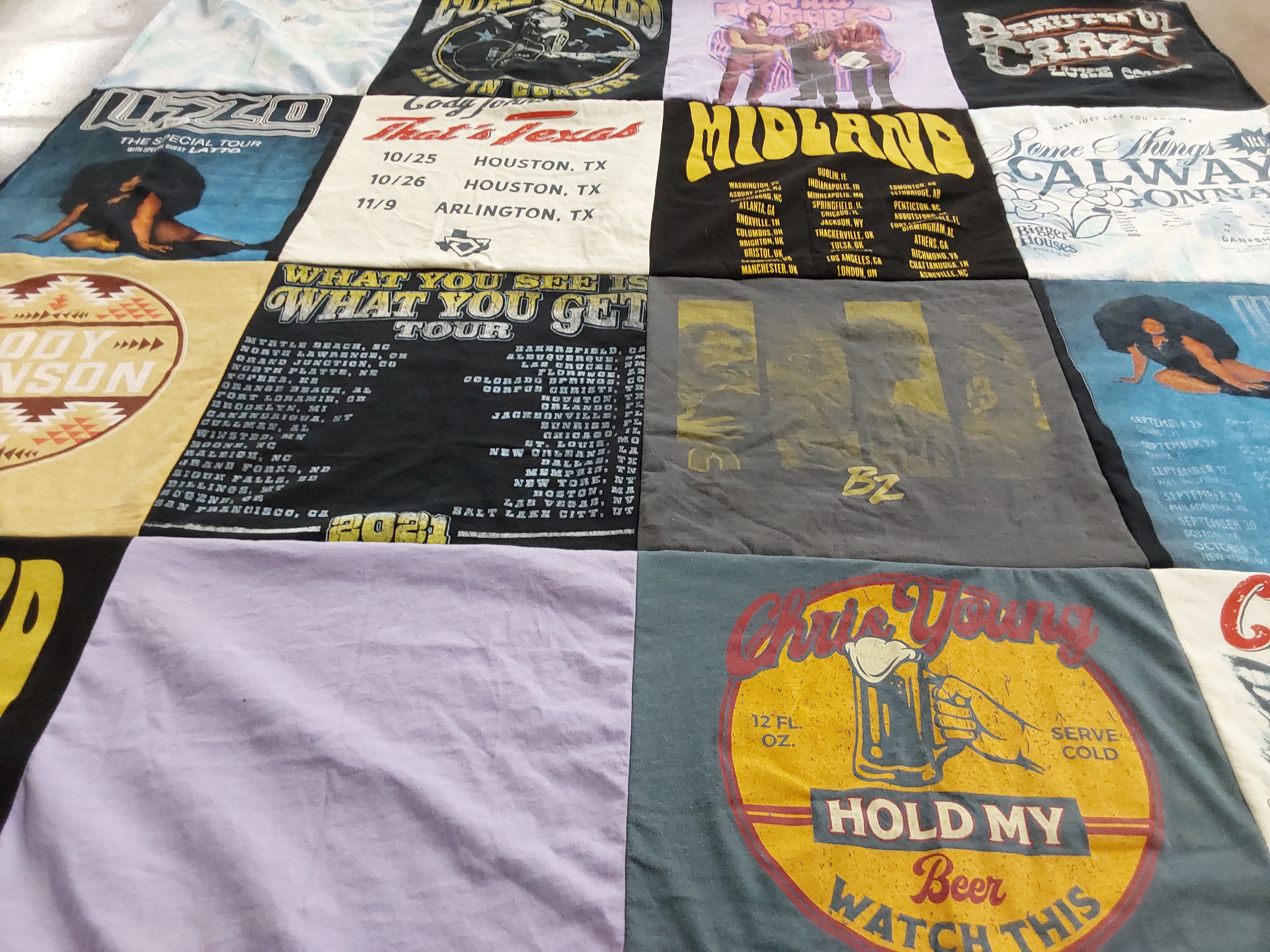 T-shirt quilt with music, concerts themes by Cheryl from TX