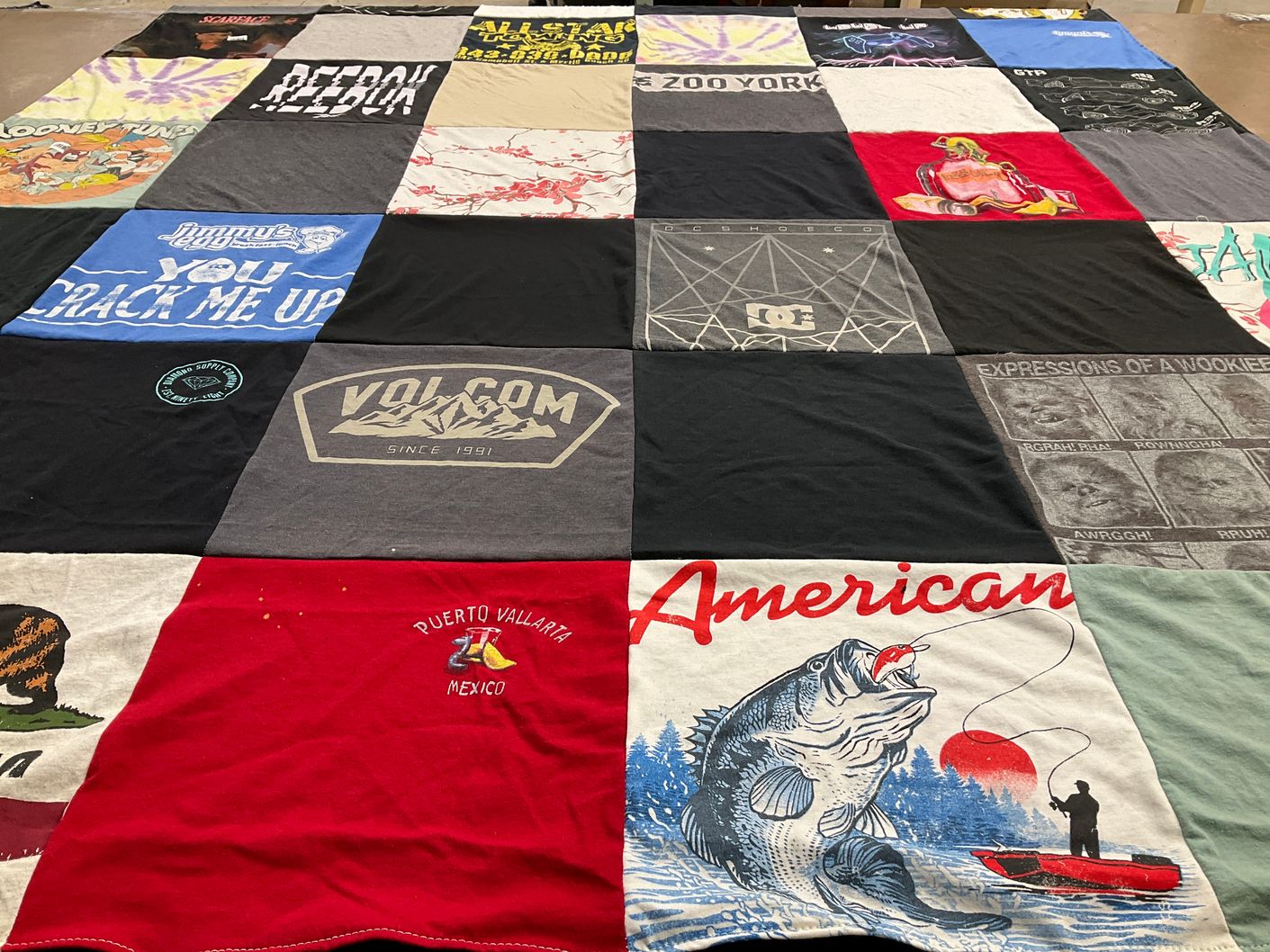 T-shirt quilt with fishing, travel themes by Michal-Ann from KS