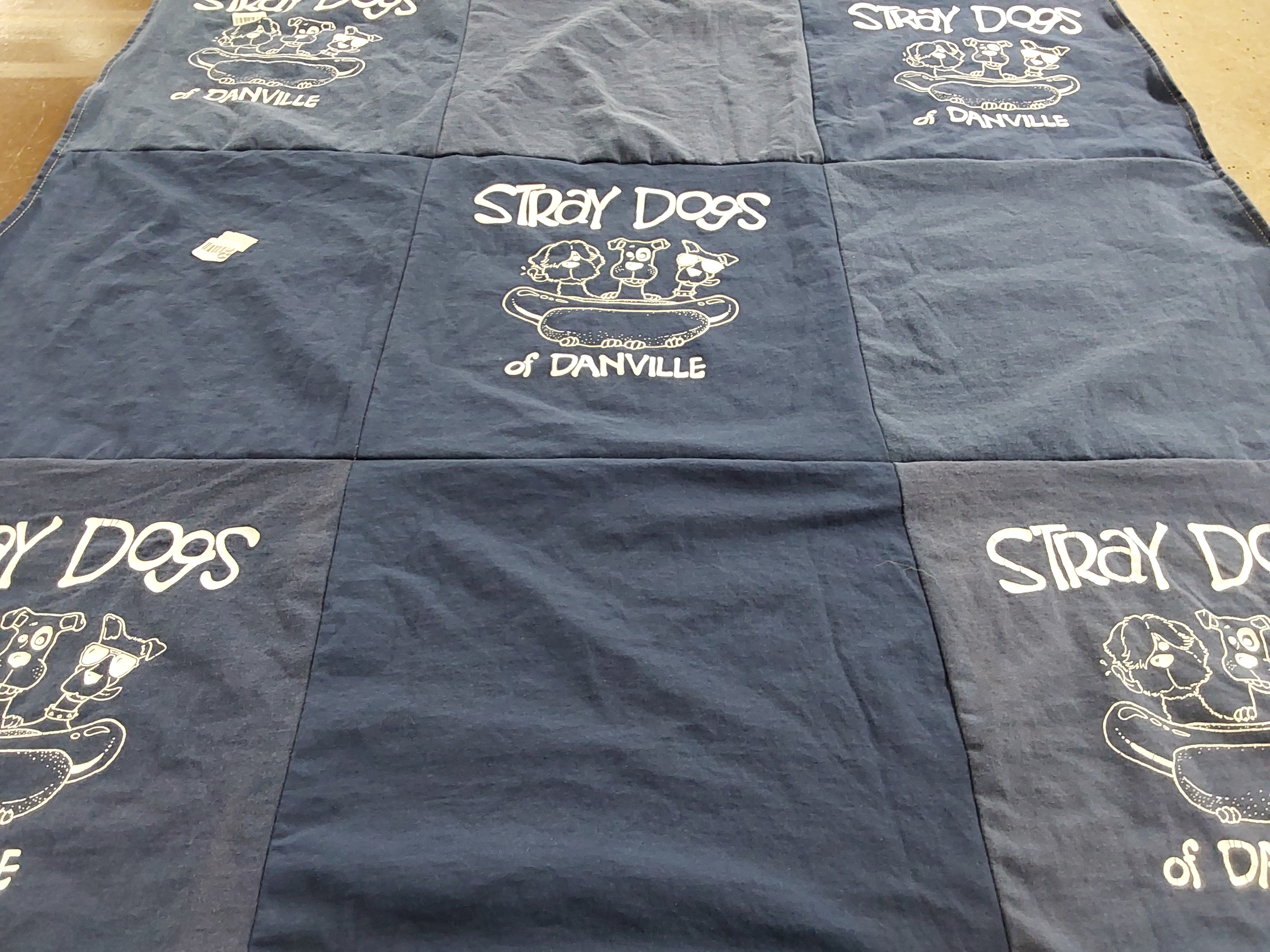 T-shirt quilt with animal welfare, dog rescue themes by Erin from CA