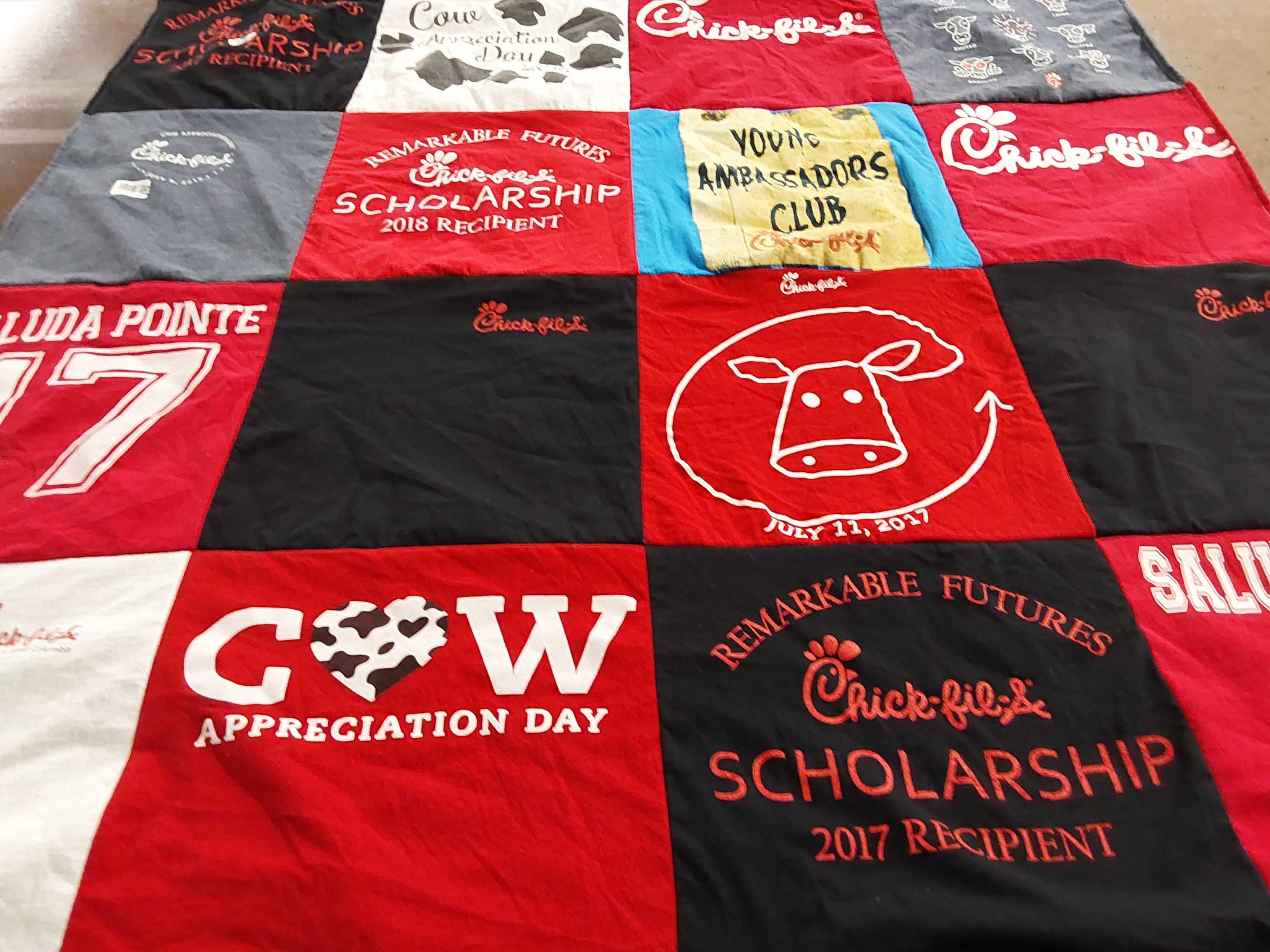 T-shirt quilt with scholarships, community programs themes by Kayleigh from SC