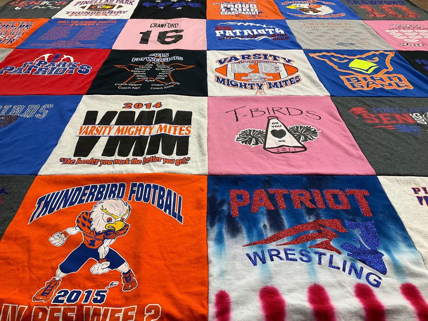 T-shirt quilt featuring thunderbird football, patriot wrestling by Heather from FL