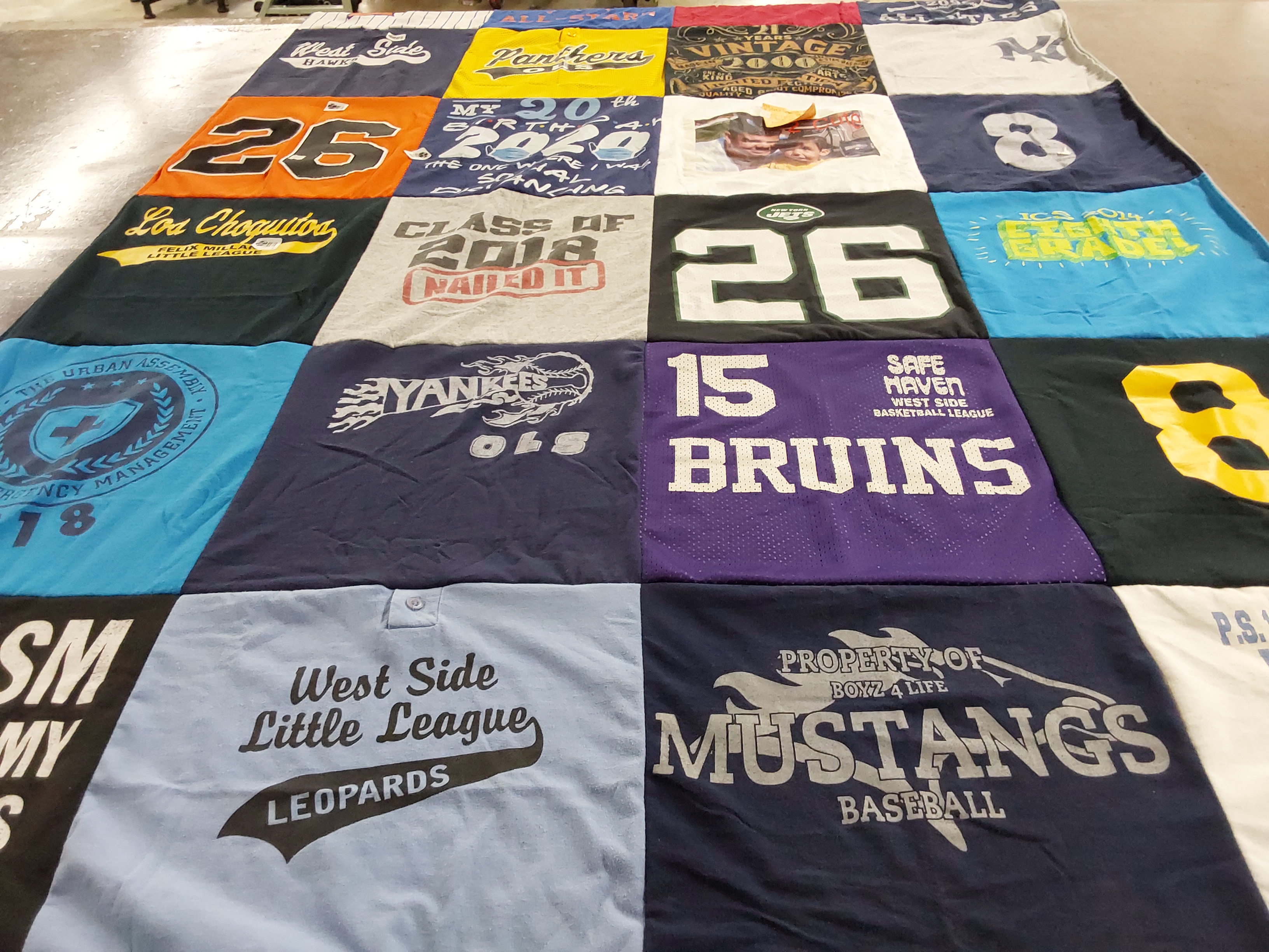 T-shirt quilt with baseball, basketball themes by Mariela from NY