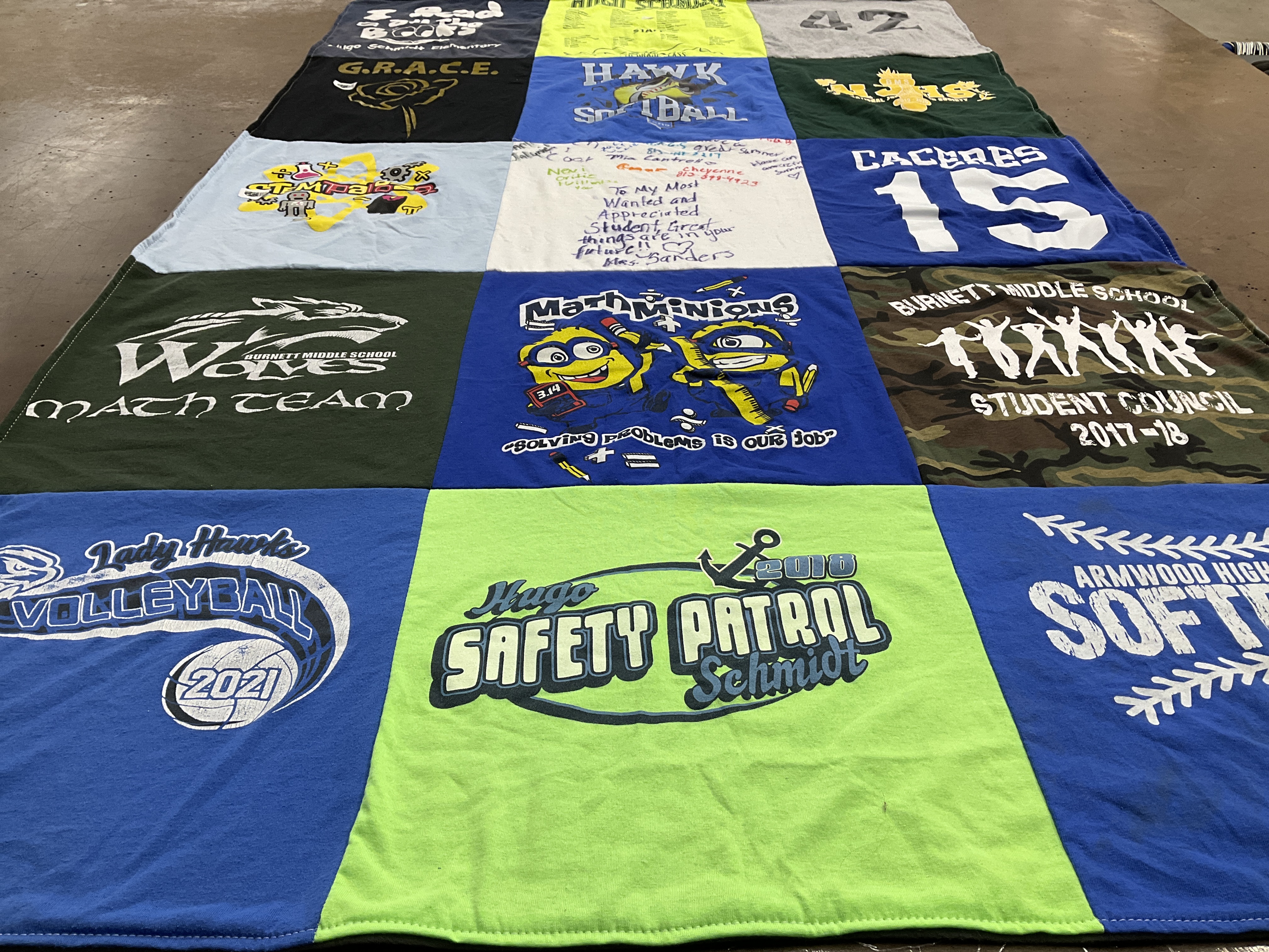 T-shirt quilt featuring lady hawks volleyball, hugo safety patrol by Barbara from FL