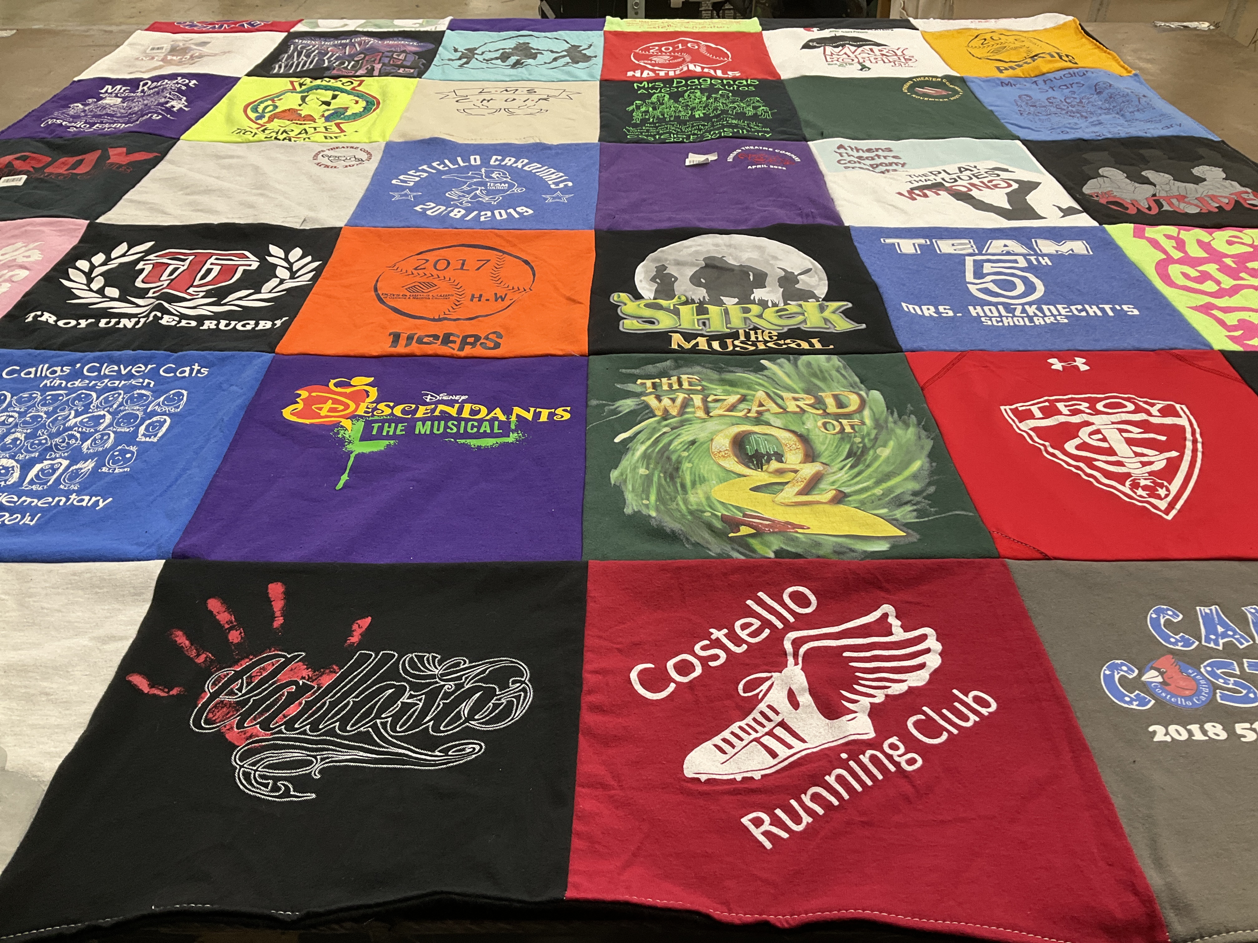 T-shirt quilt featuring troy united rugby, costello running club by Karie from MI