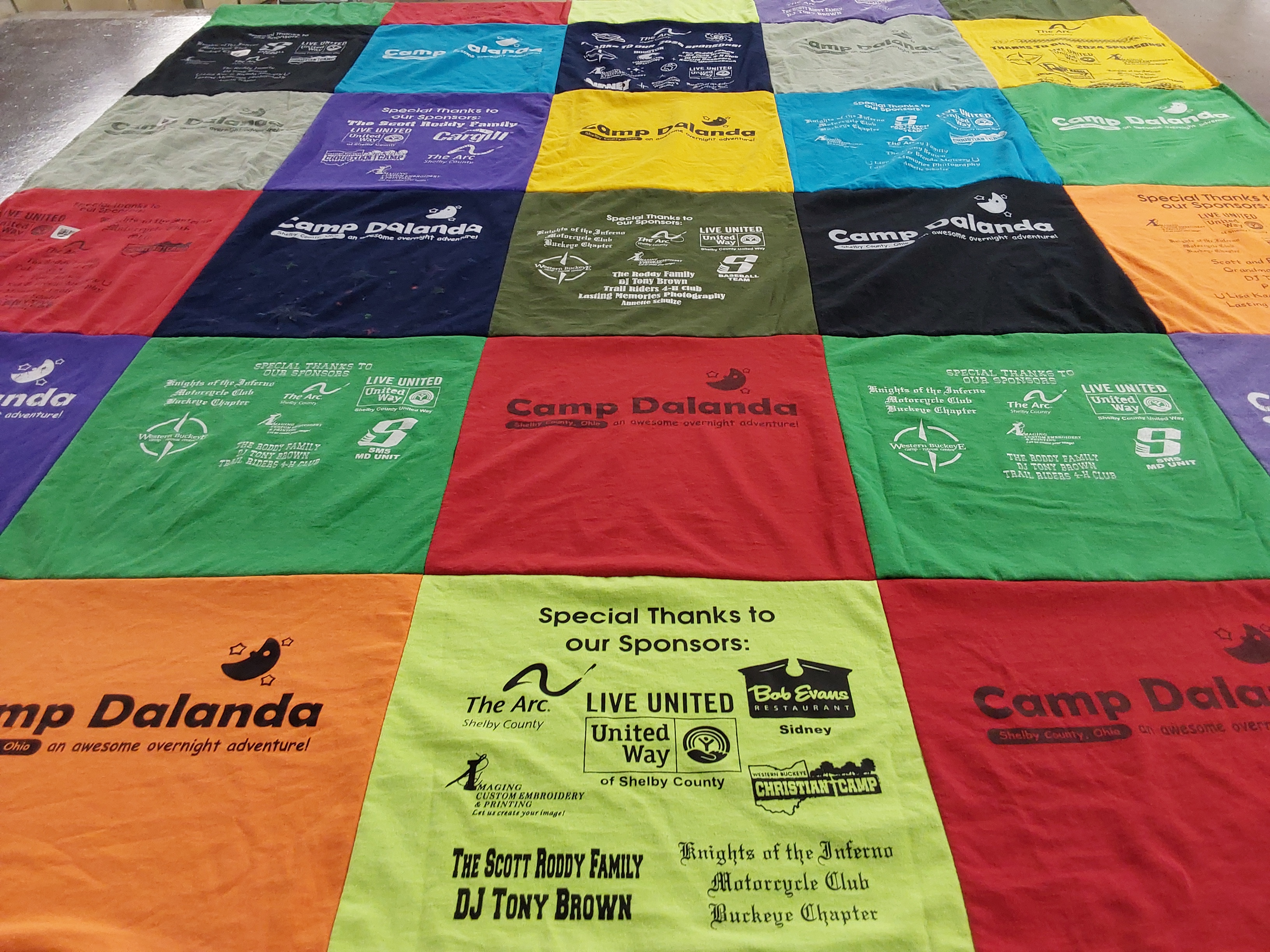 T-shirt quilt with camping, community service themes by Cheryl from OH