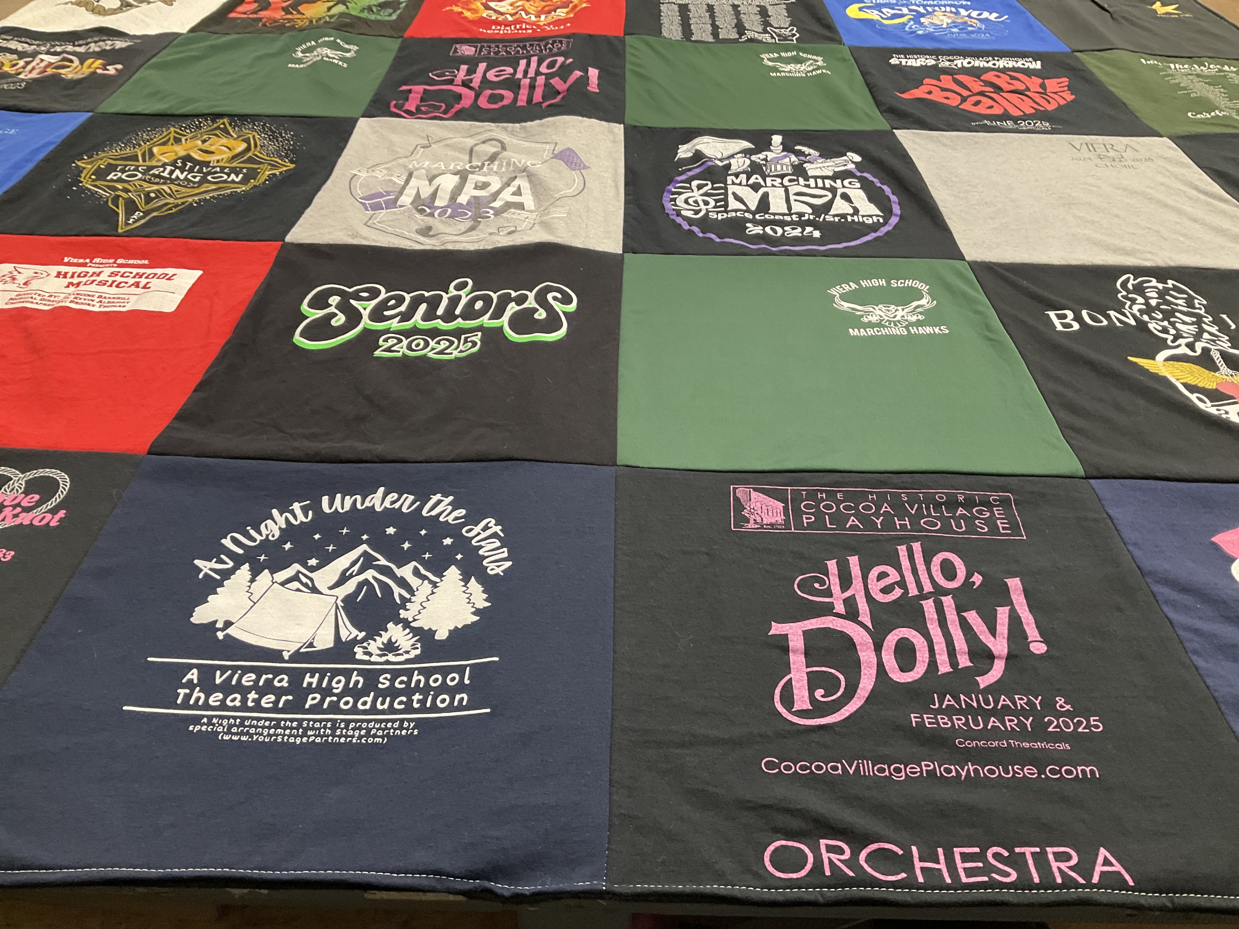 T-shirt quilt featuring marching hanks by Stacey from FL