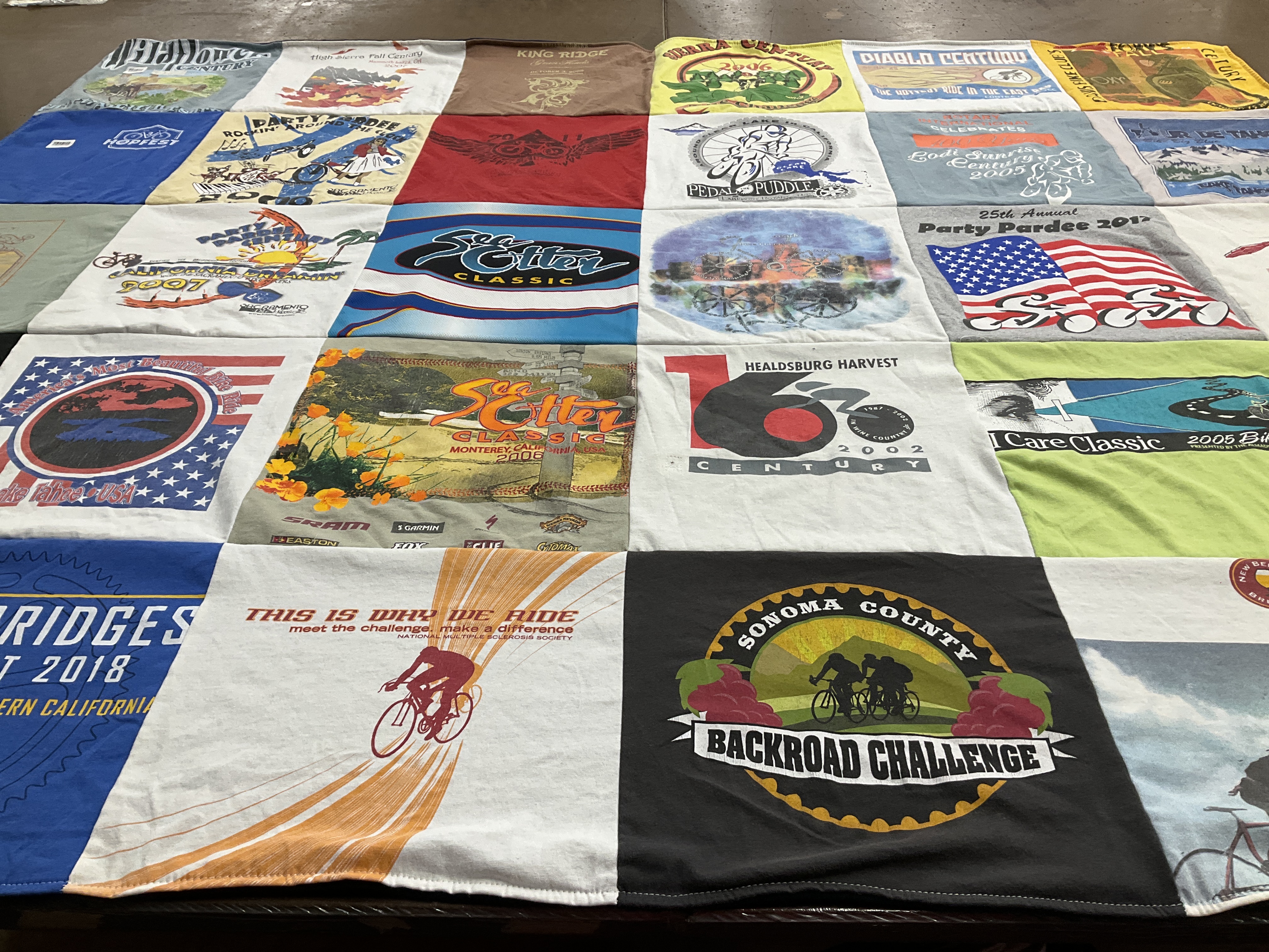 T-shirt quilt with cycling, bicycling themes by John from CA