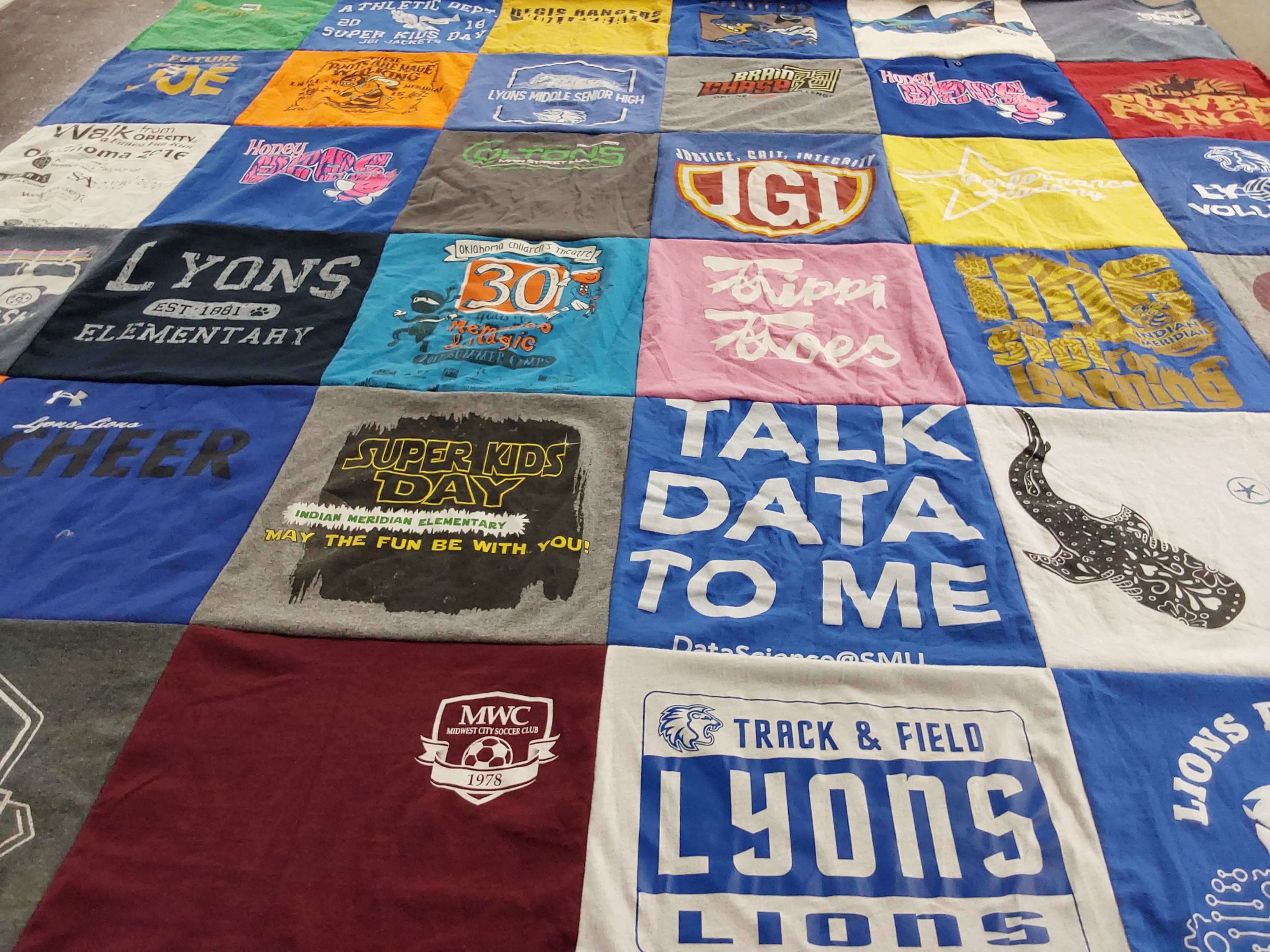 T-shirt quilt featuring lyons track and field by Cheryl from CO