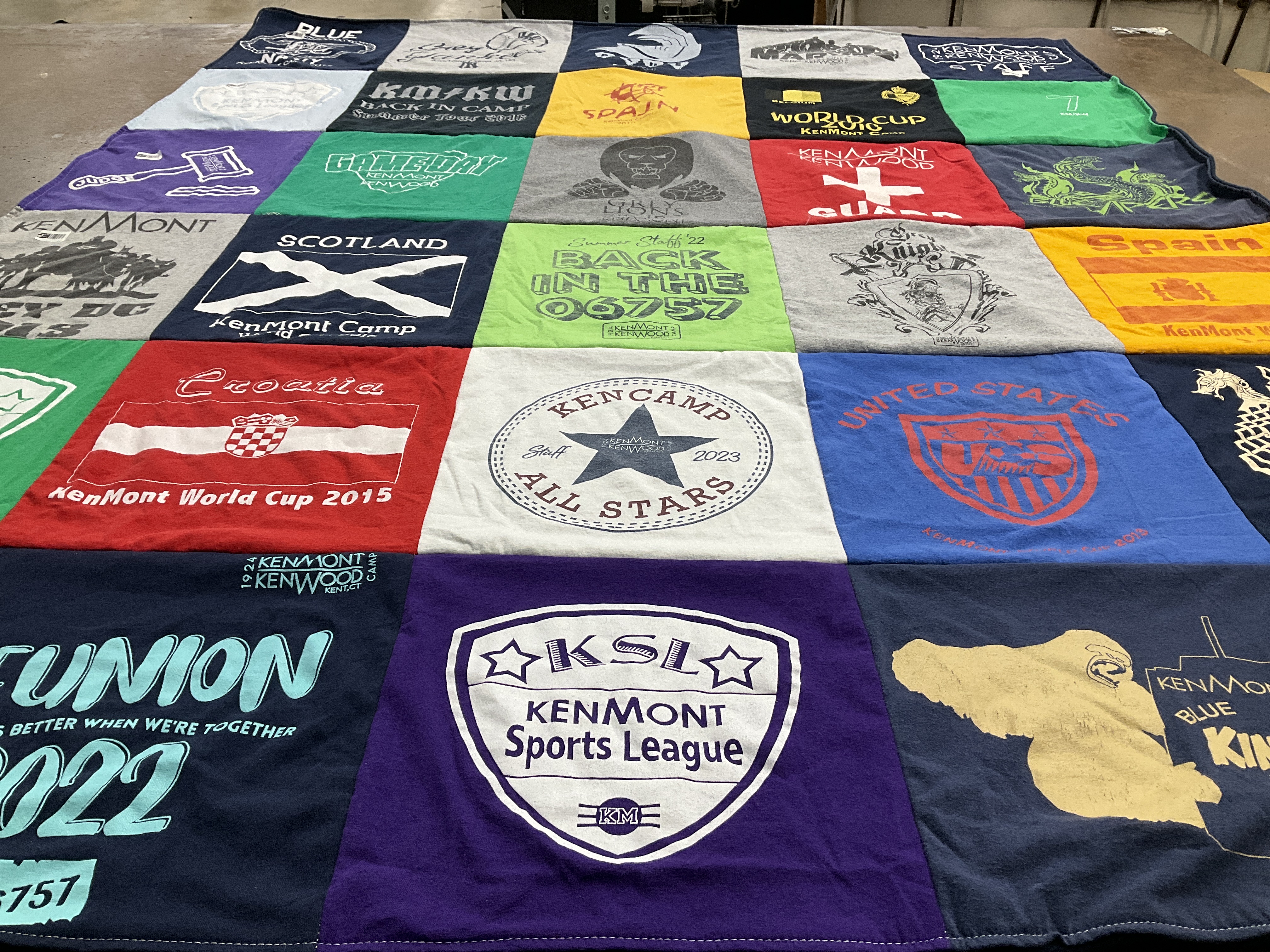 T-shirt quilt with camping, sports themes by Jill from PA