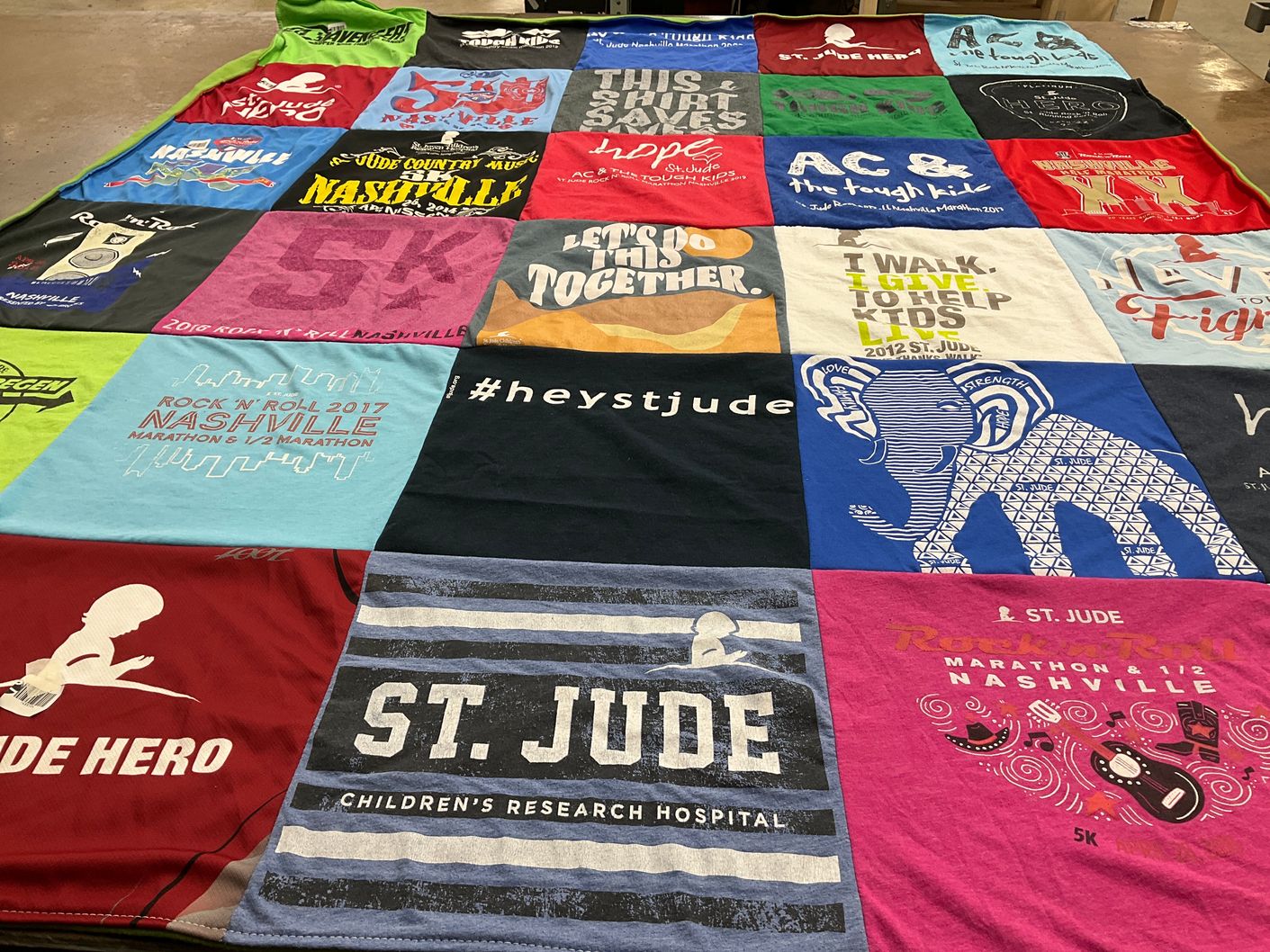 T-shirt quilt with marathons, charity themes by Lynn from TN