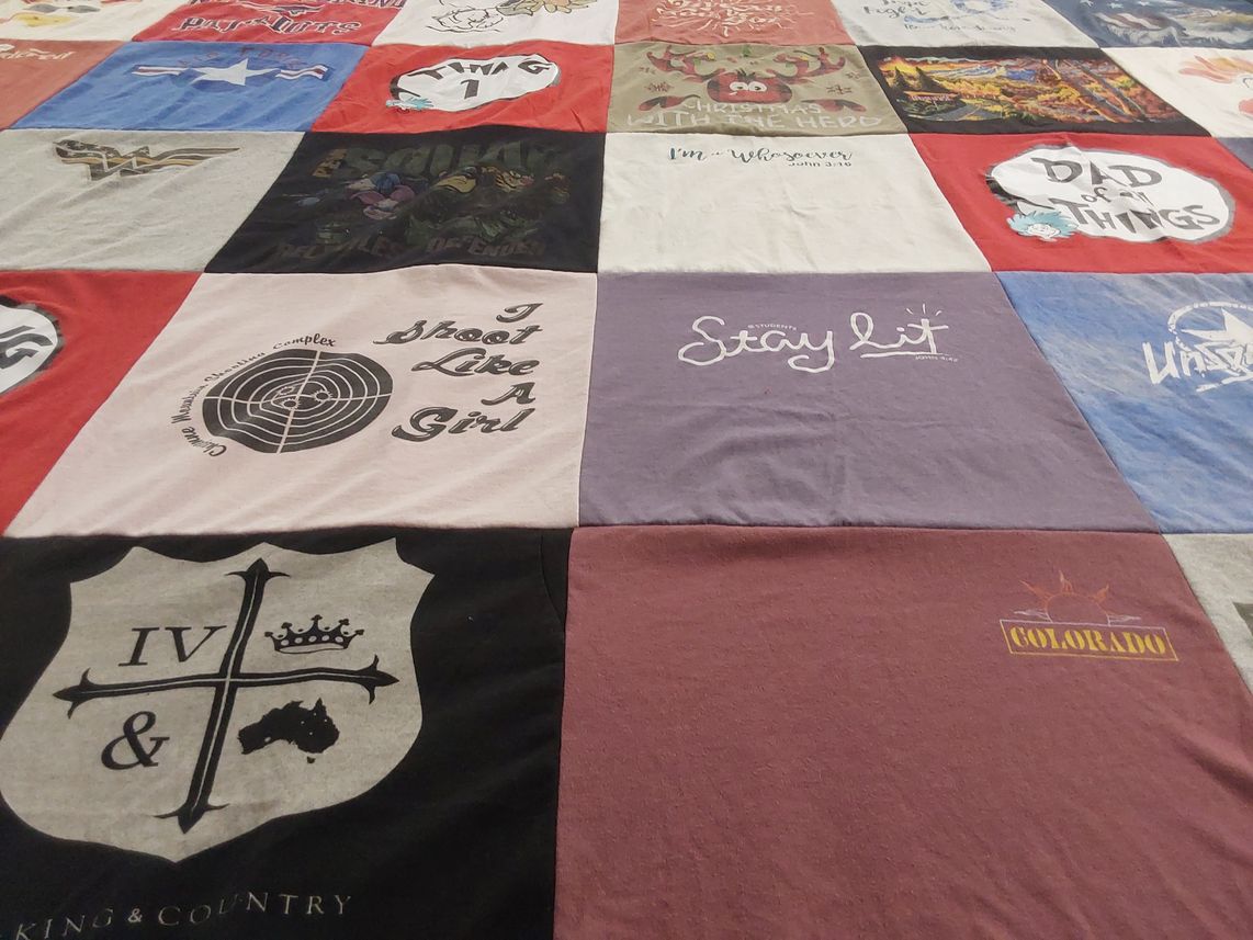 T-shirt quilt with shooting, music themes by Joann from CO