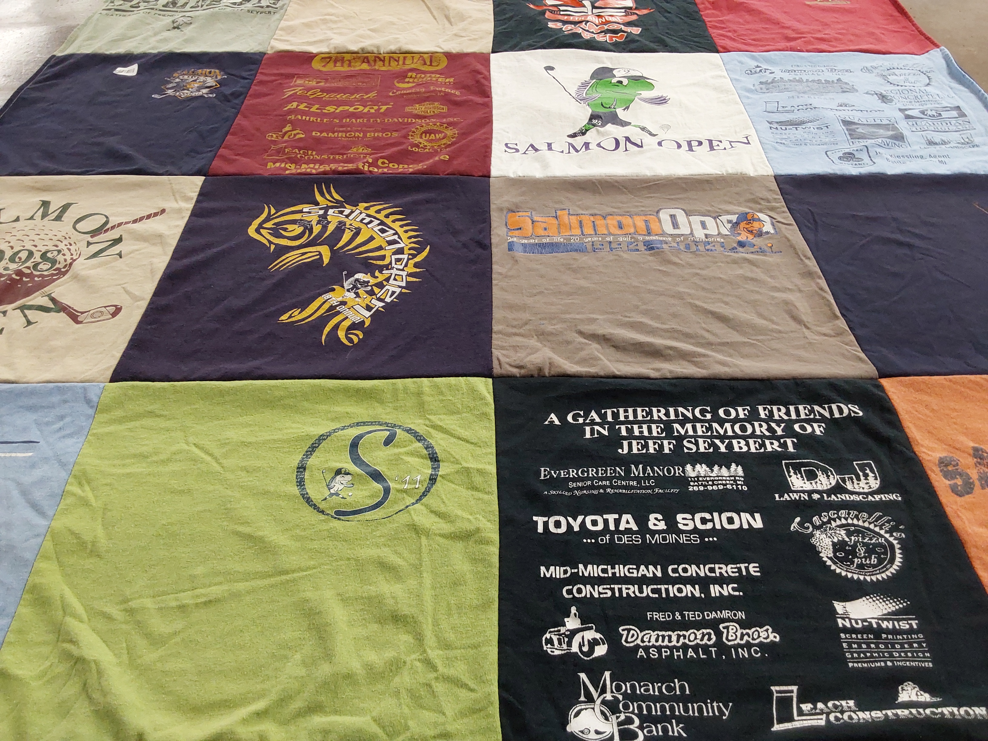 T-shirt quilt with fishing, golf themes by David from NC