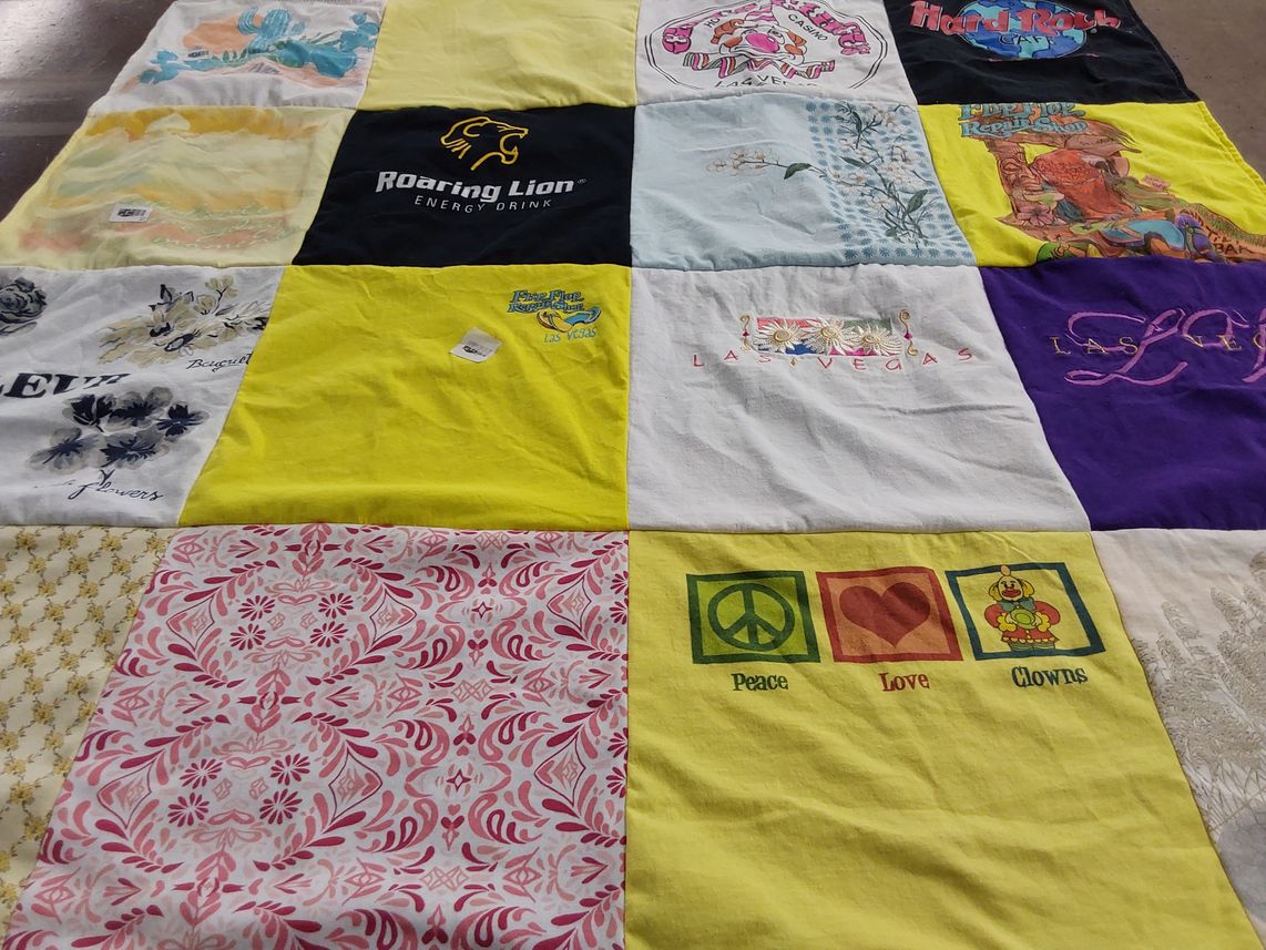 T-shirt quilt with gaming, music themes by Deborah from NV
