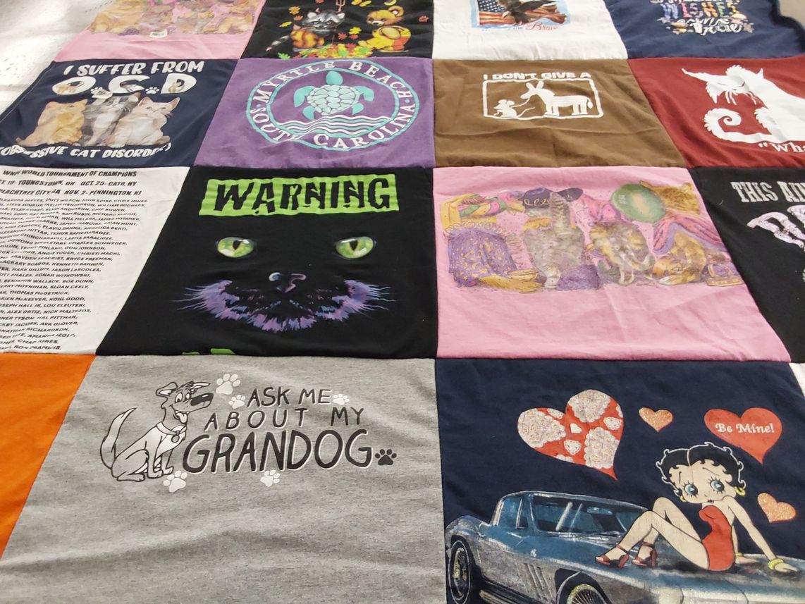 T-shirt quilt with cats, dogs themes by TeriL. from NY