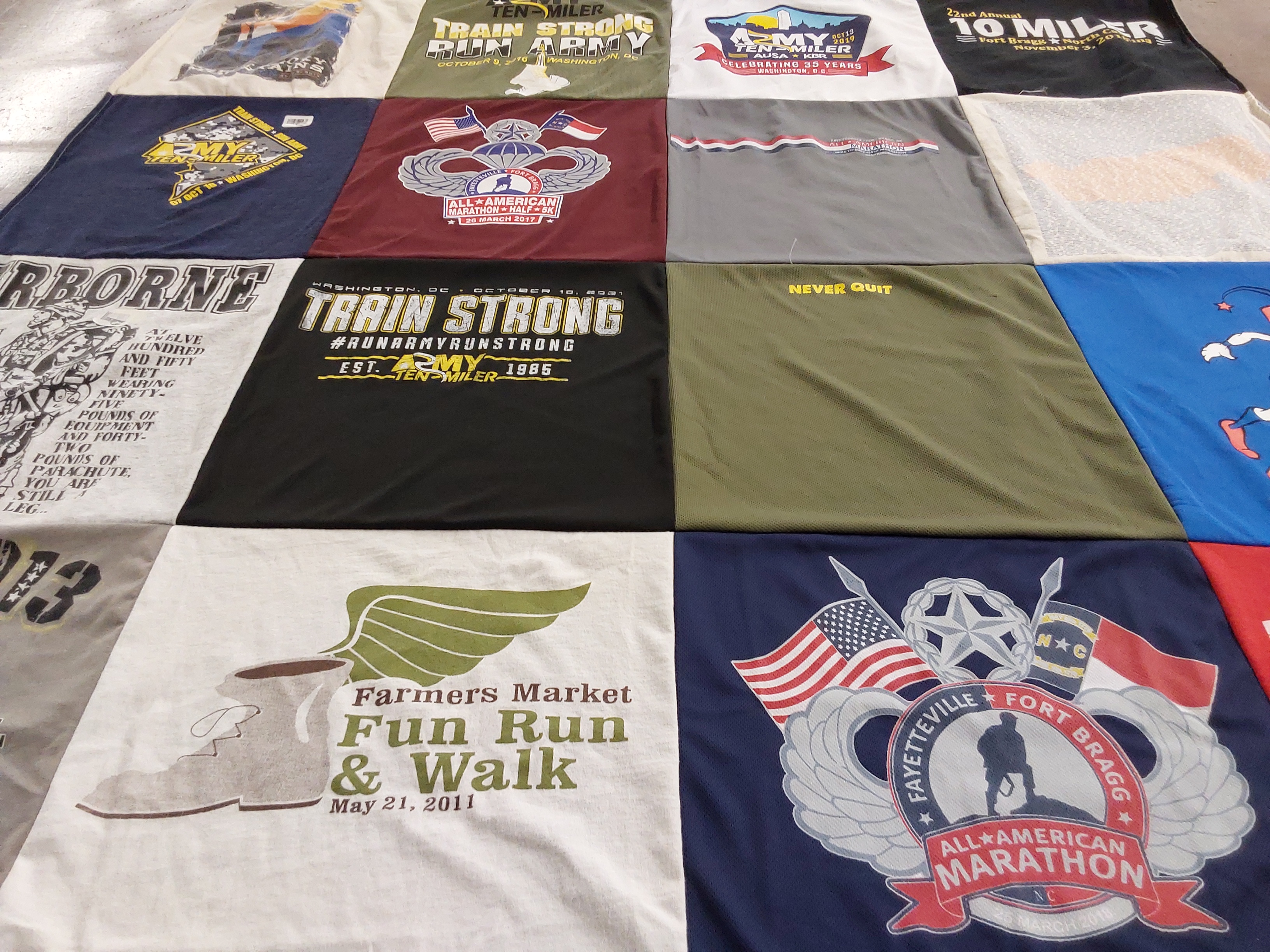 T-shirt quilt with running, fitness themes by Lou from NC