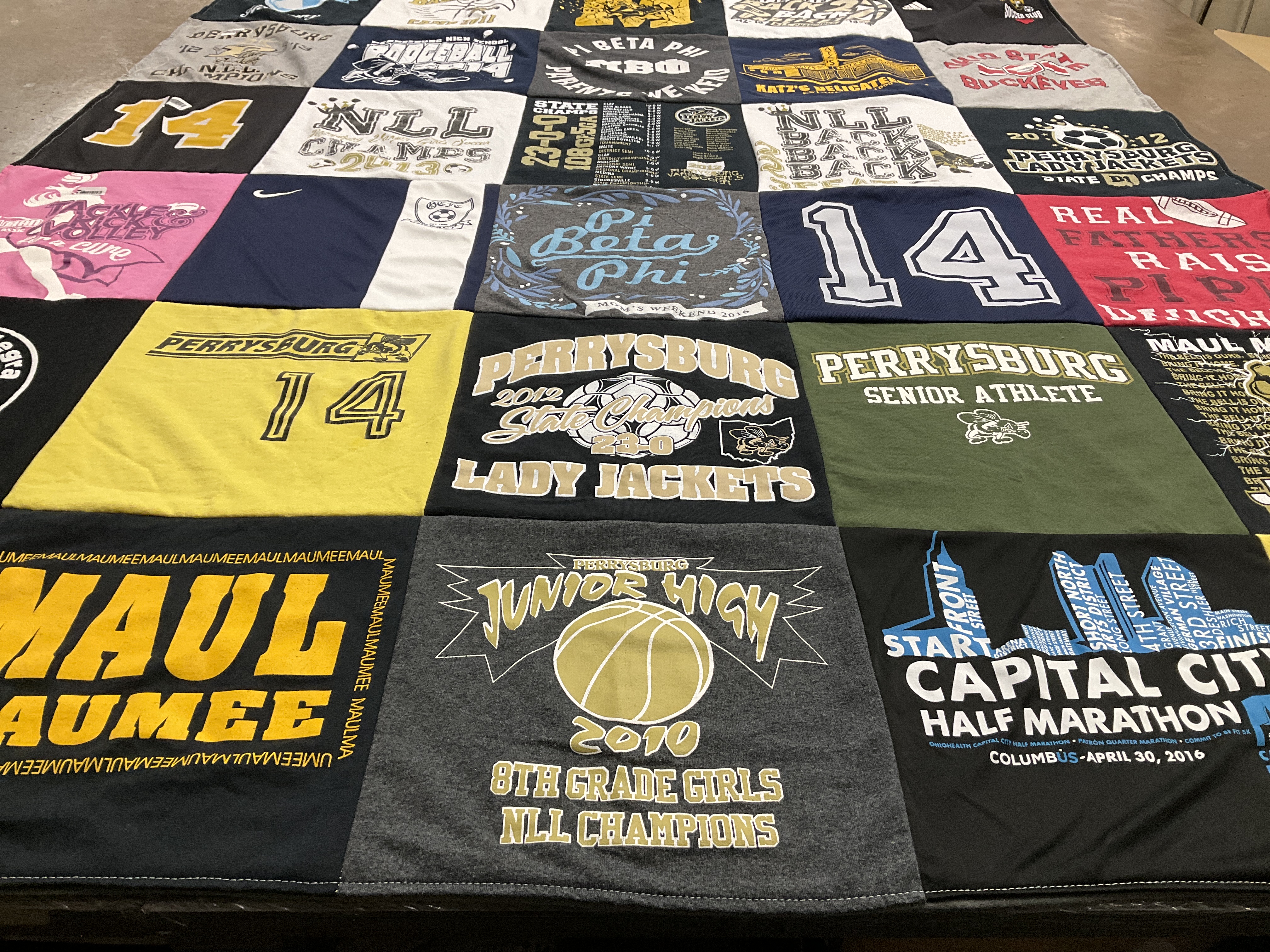 T-shirt quilt featuring perrysburg lady jackets by Julia from OH