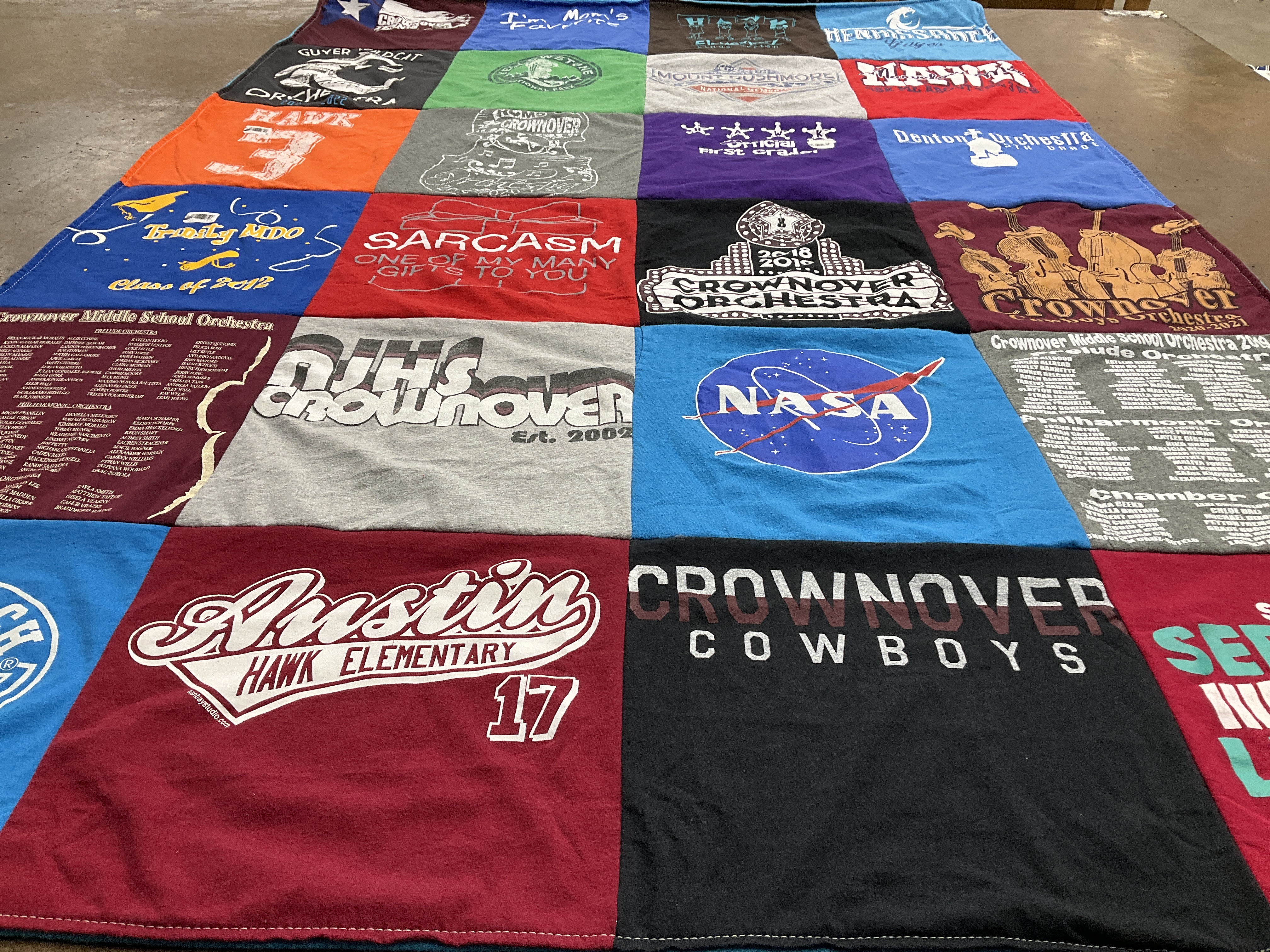 T-shirt quilt featuring crownnover cowboys by Carolyn from TX